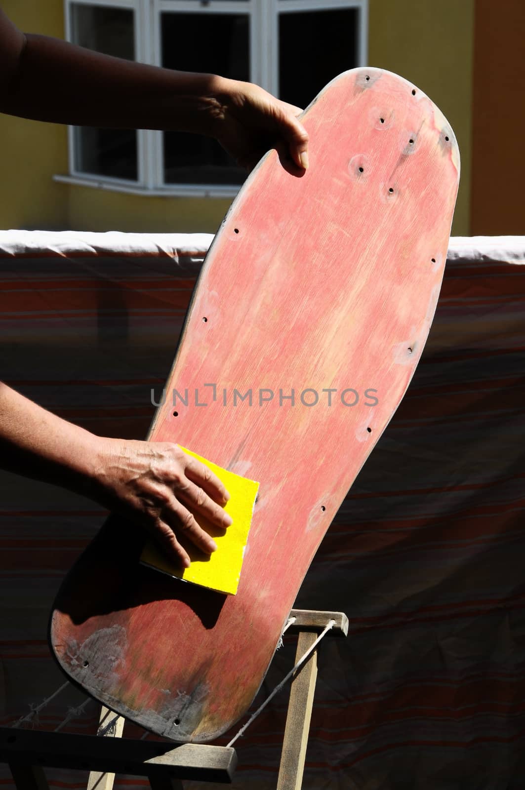 Restore an Old Skateboard with a Yellow Sandpaper