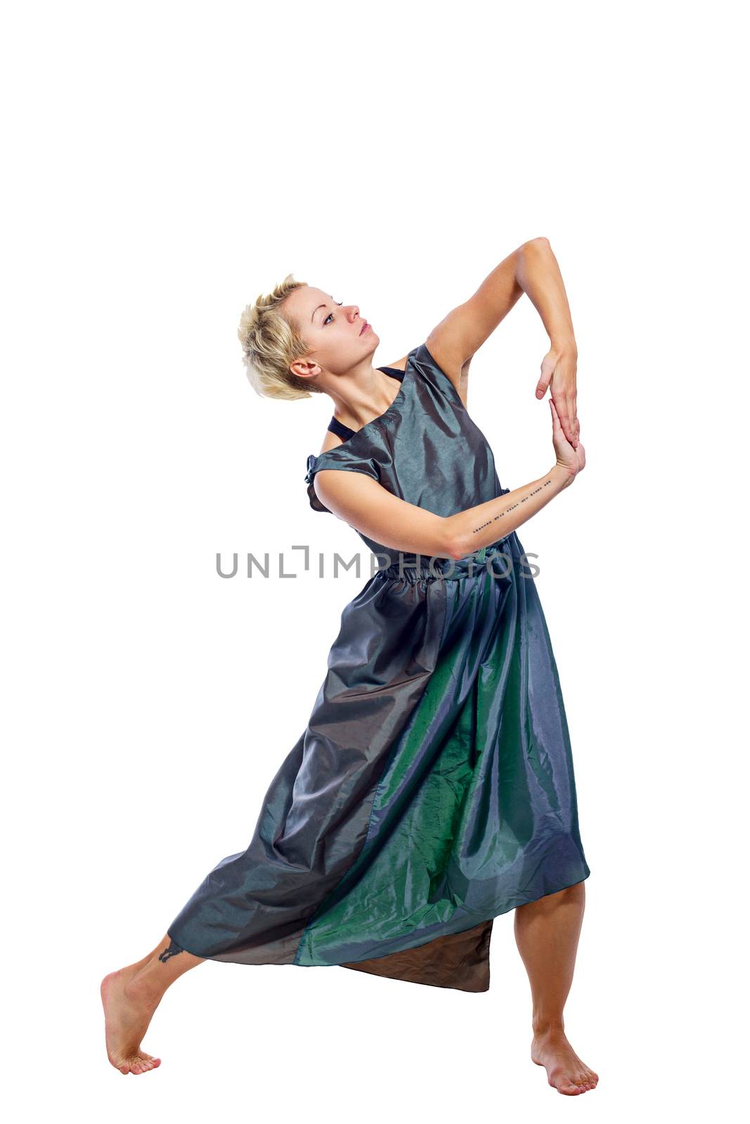 Girl moves in a dance isolated on a white background