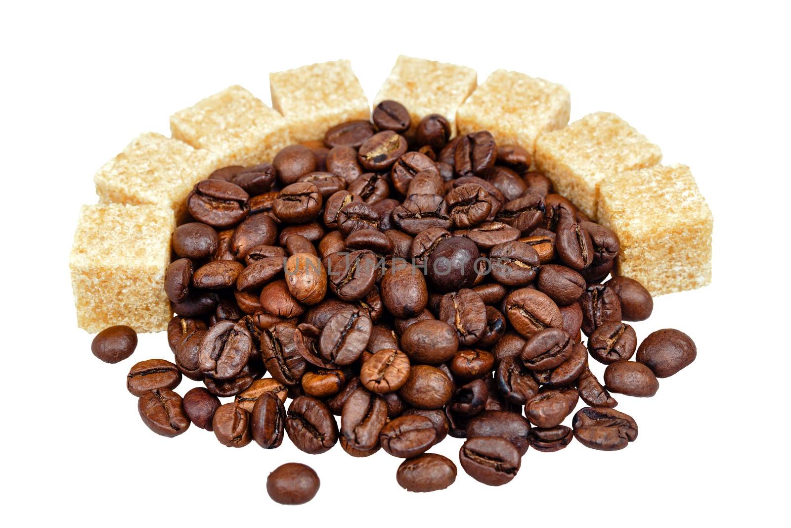 Coffee grains and refined sugar isolated on a white background, shot in studio