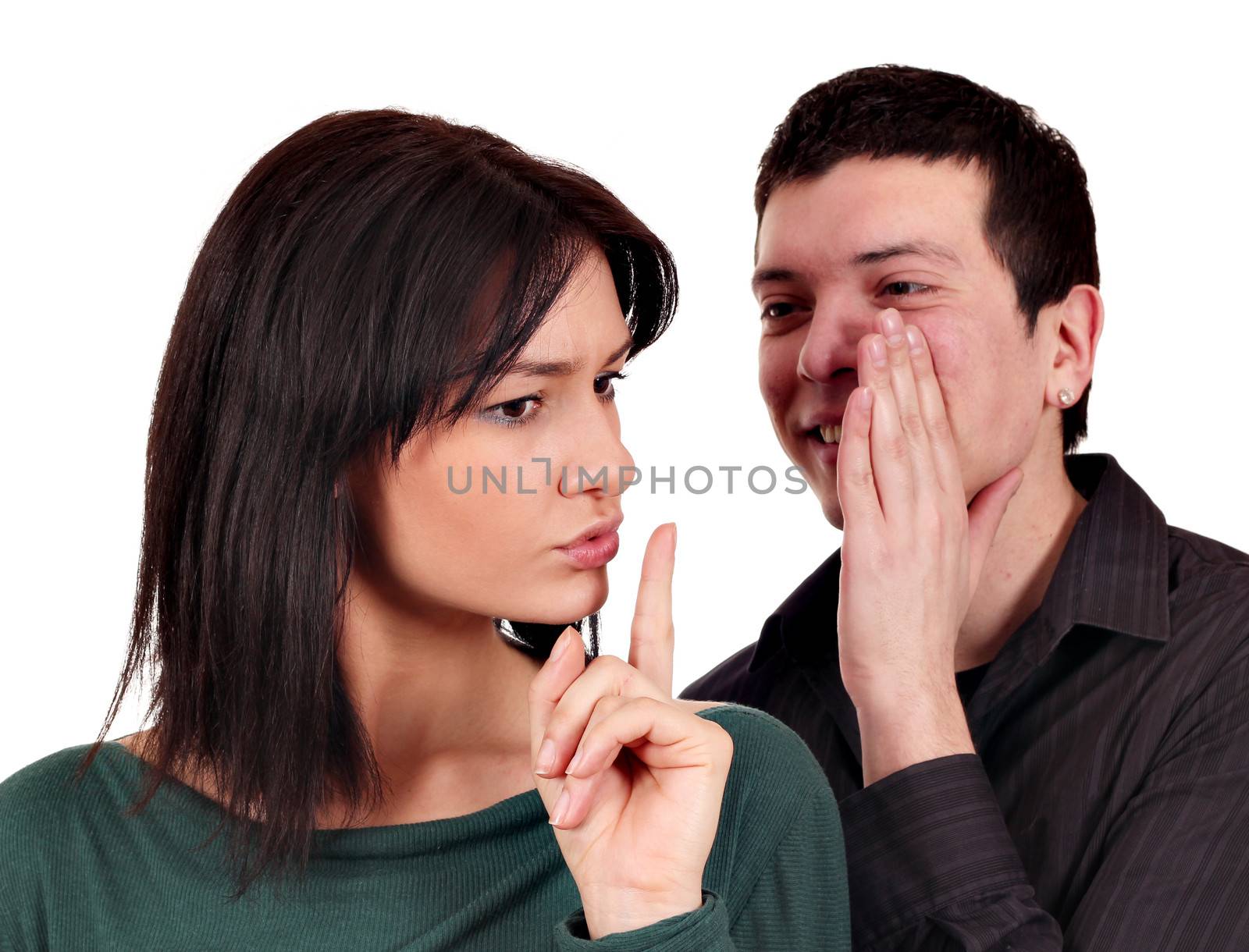 boyfriend whispers a secret to girlfriend by goce