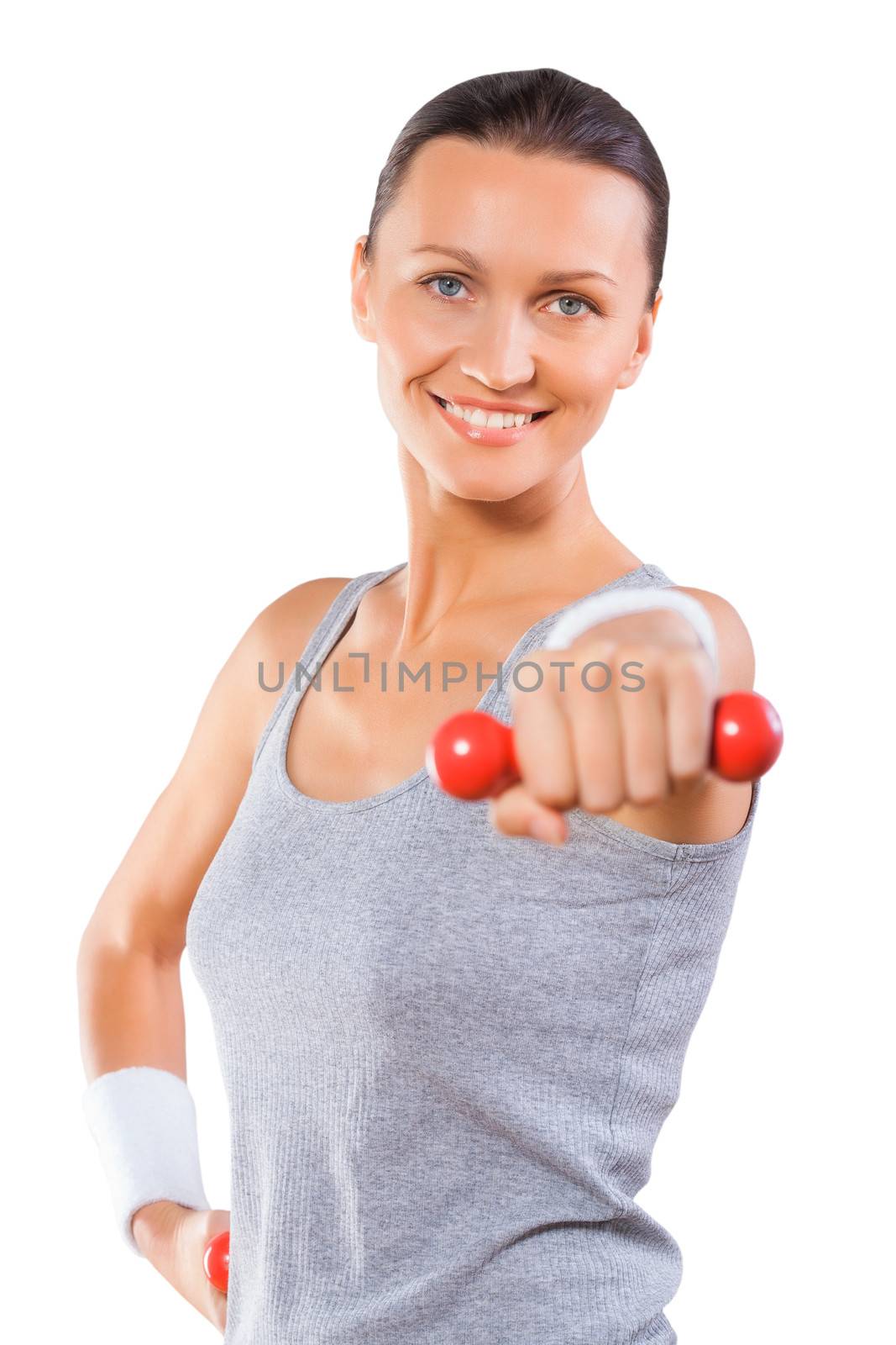 a sports female holding dumbbell and smiling isolated by mihalec