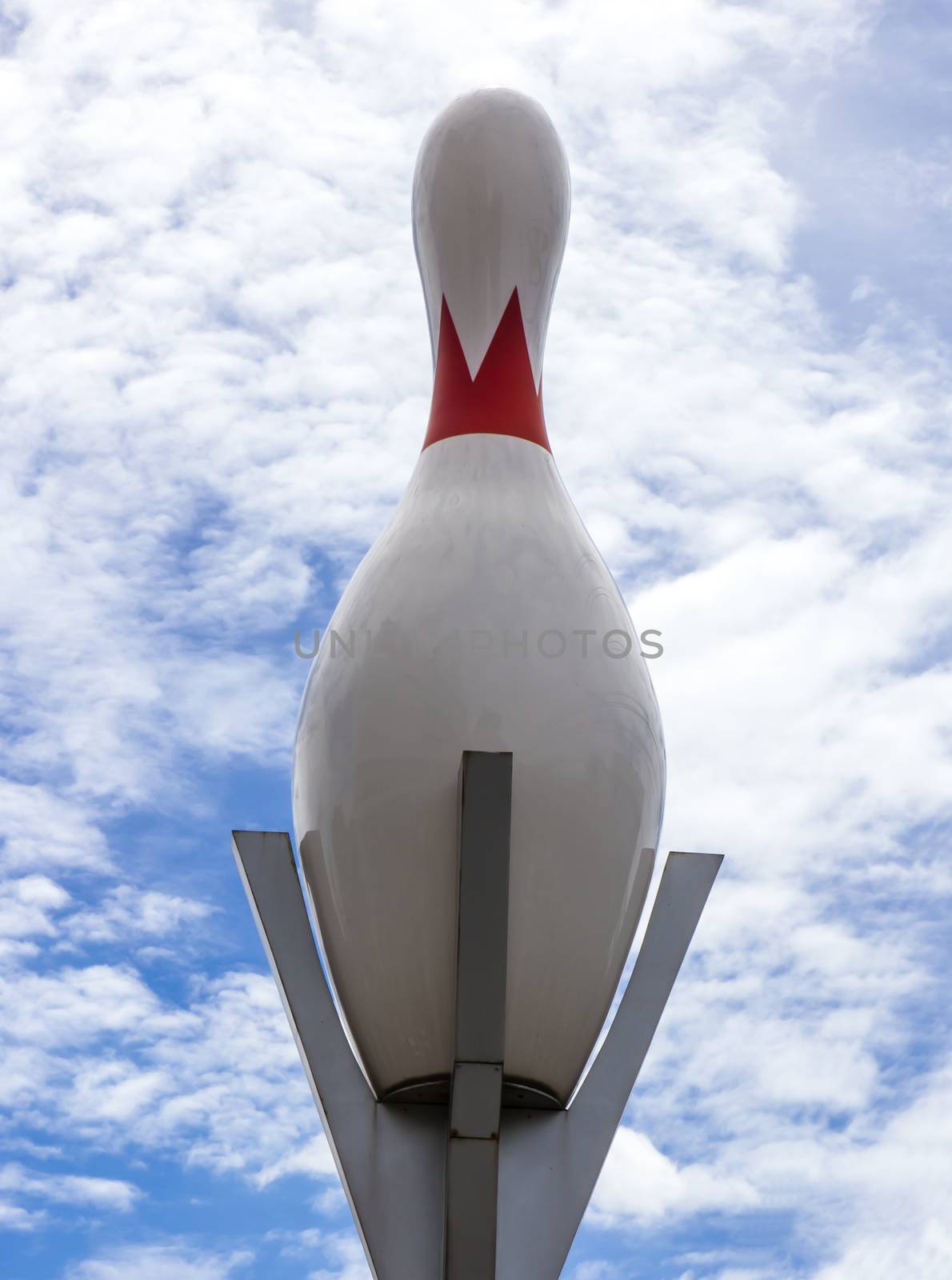 Giant Bowling Ball and Cloudy Sky by photo2life