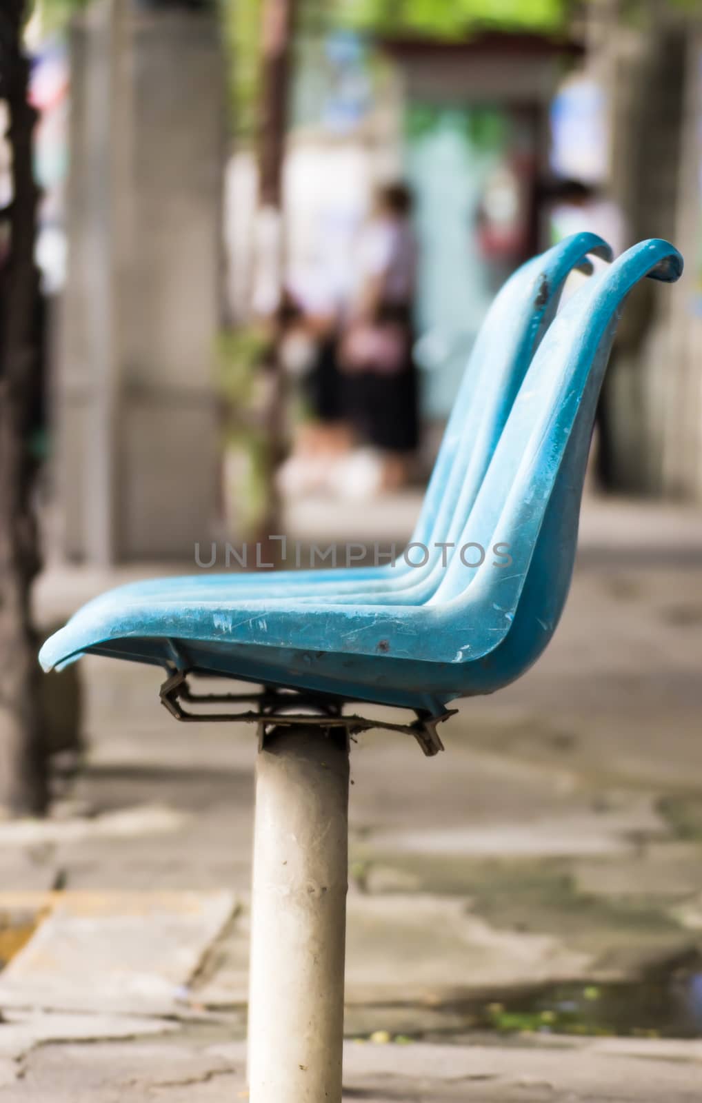 Old chair waiting for a bus.