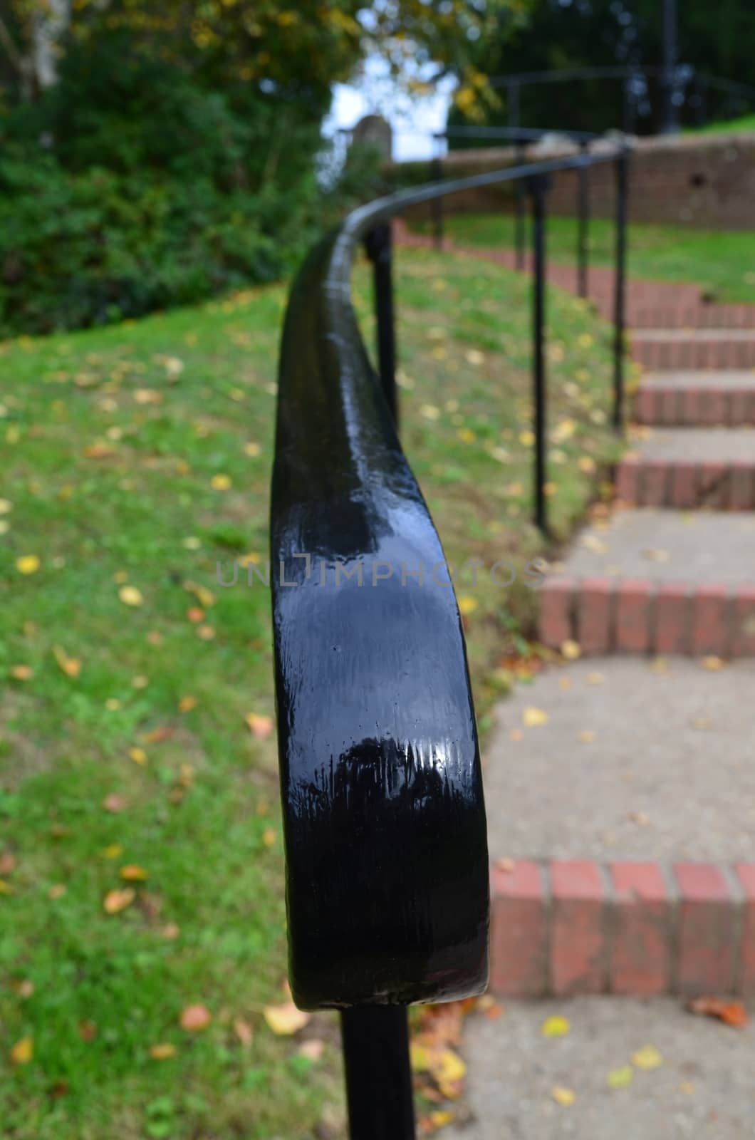 Close view image of a wrought iron handrail.