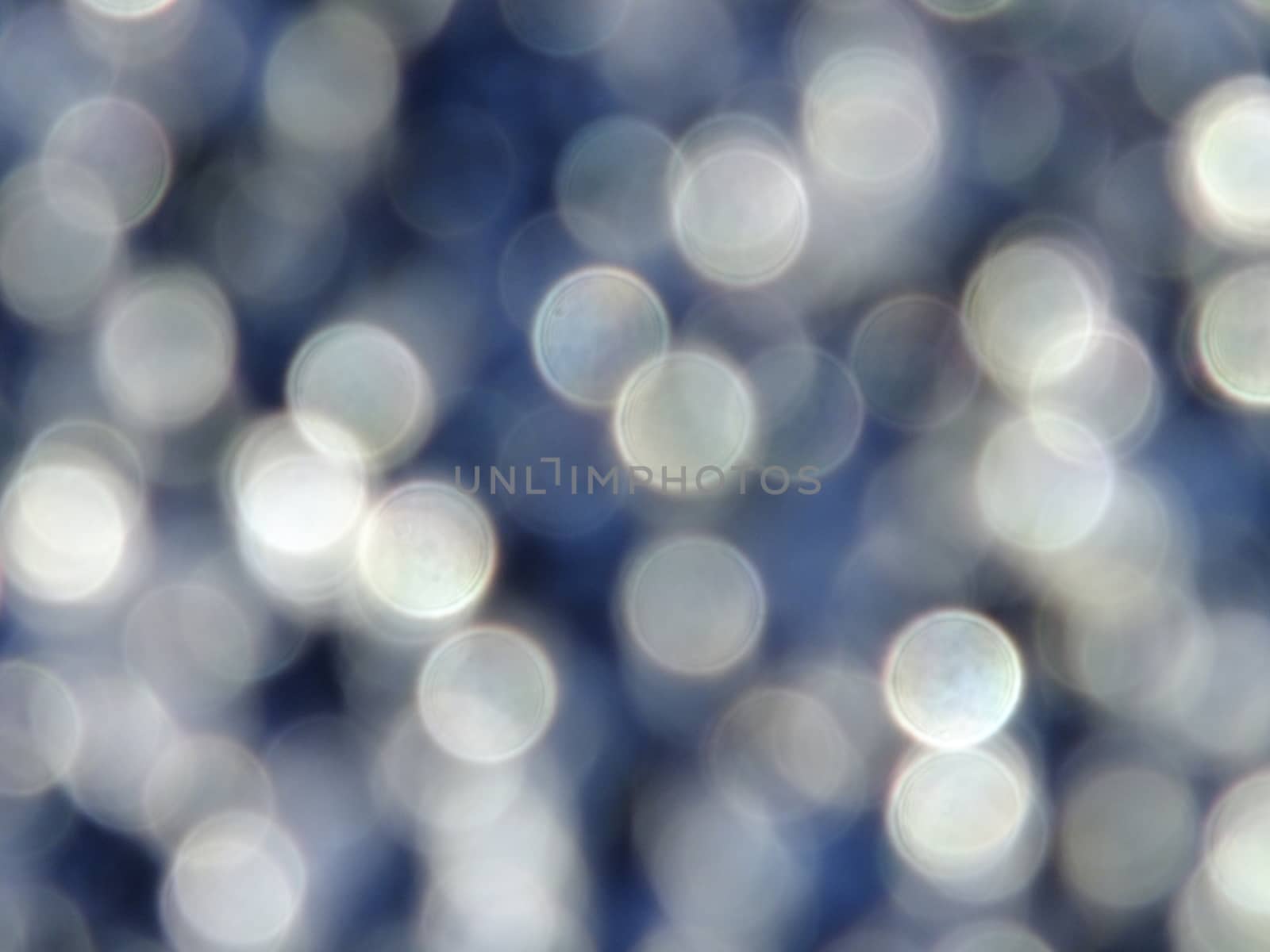 A gray blur in bokeh style - to be used as background