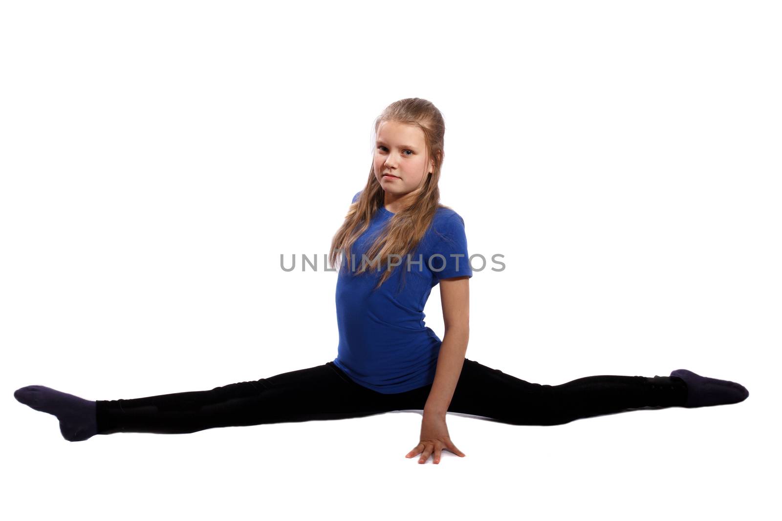 young gymnast doing splits on white background