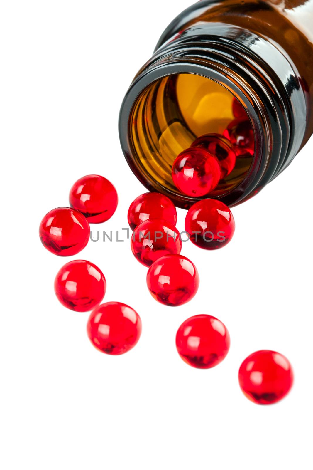 Red capsules on a white background
