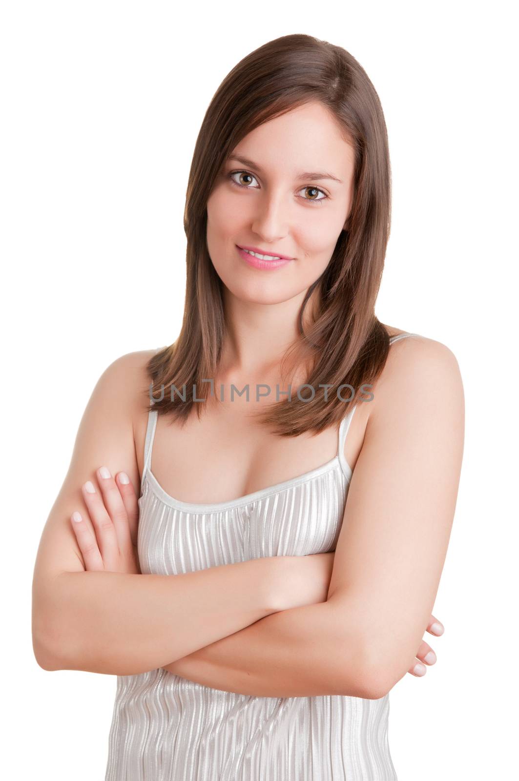 Portrait of a young woman with her arms crossed, isolated in white