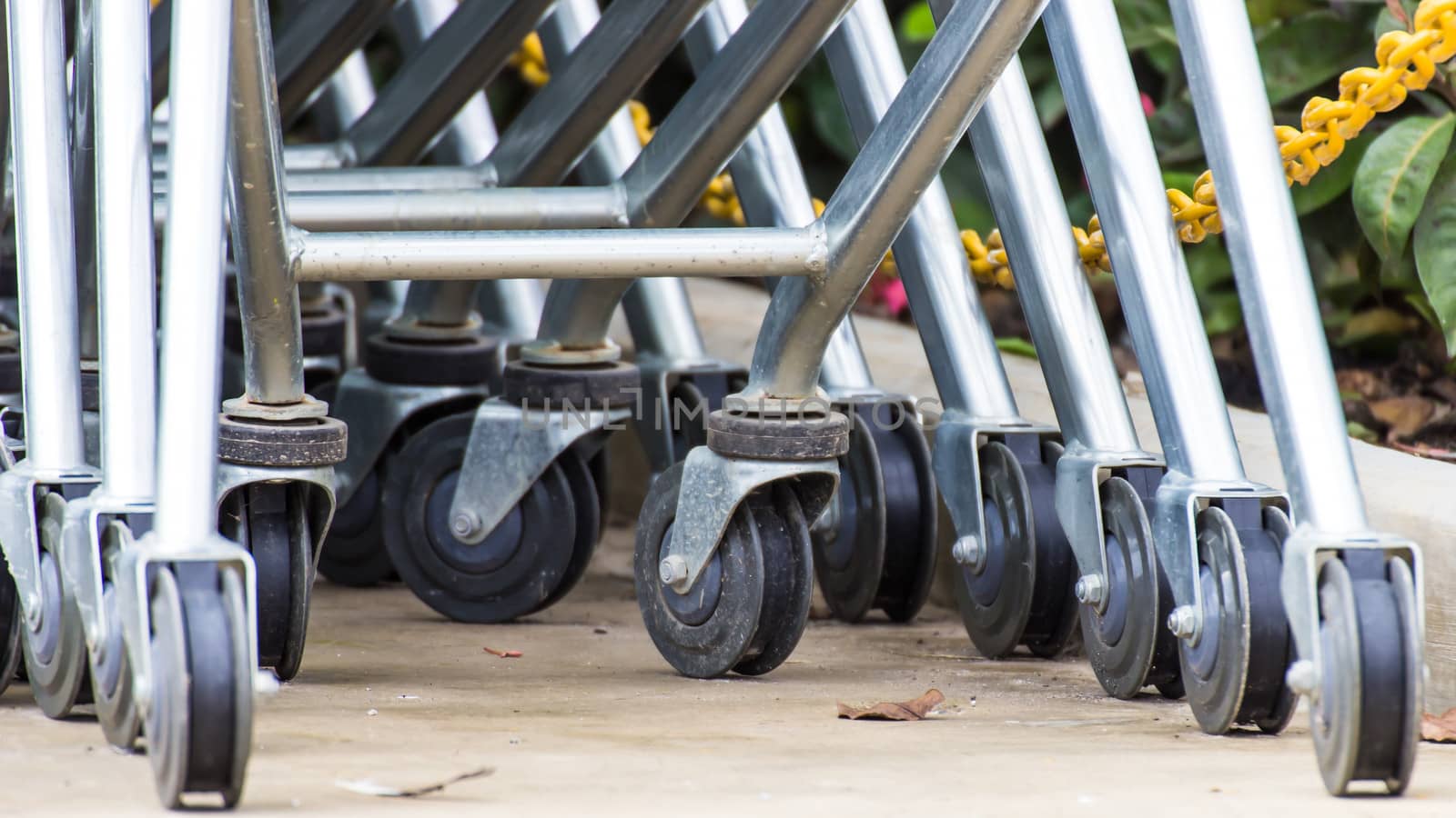 Wheel Cart,Shopping carts wheels closeup  by photo2life