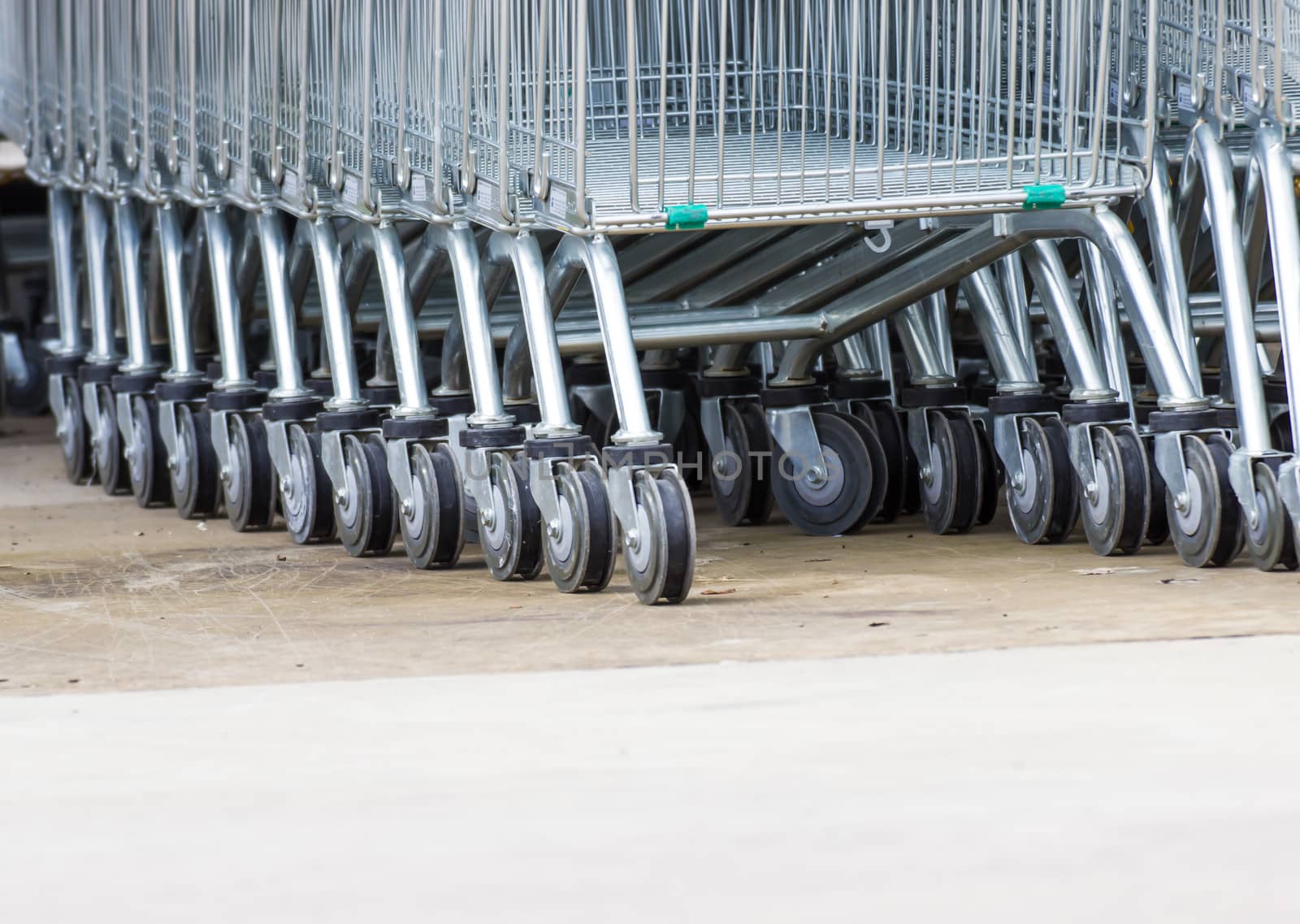 Wheel Cart,Shopping carts wheels closeup  by photo2life