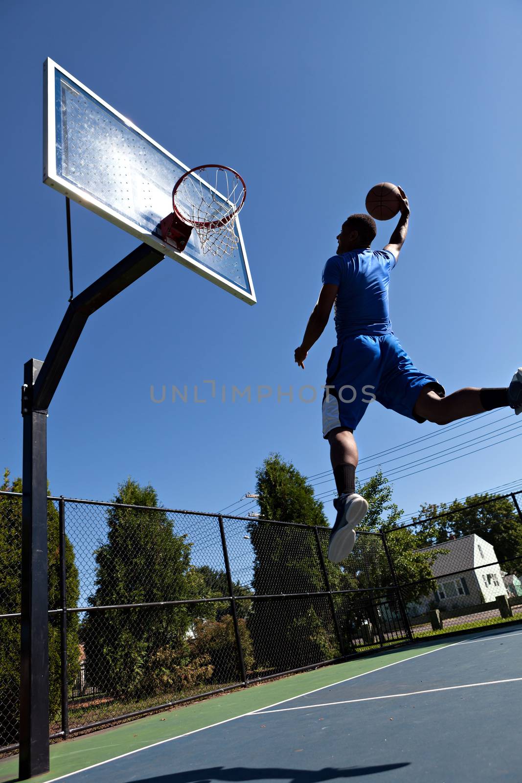 Man Dunking the Basketball by graficallyminded