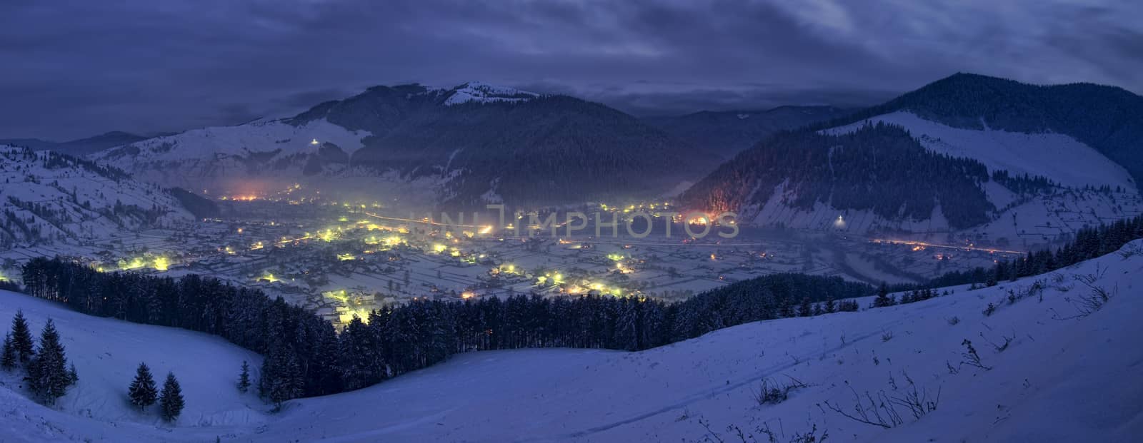 rural landscape of winter night in Romania