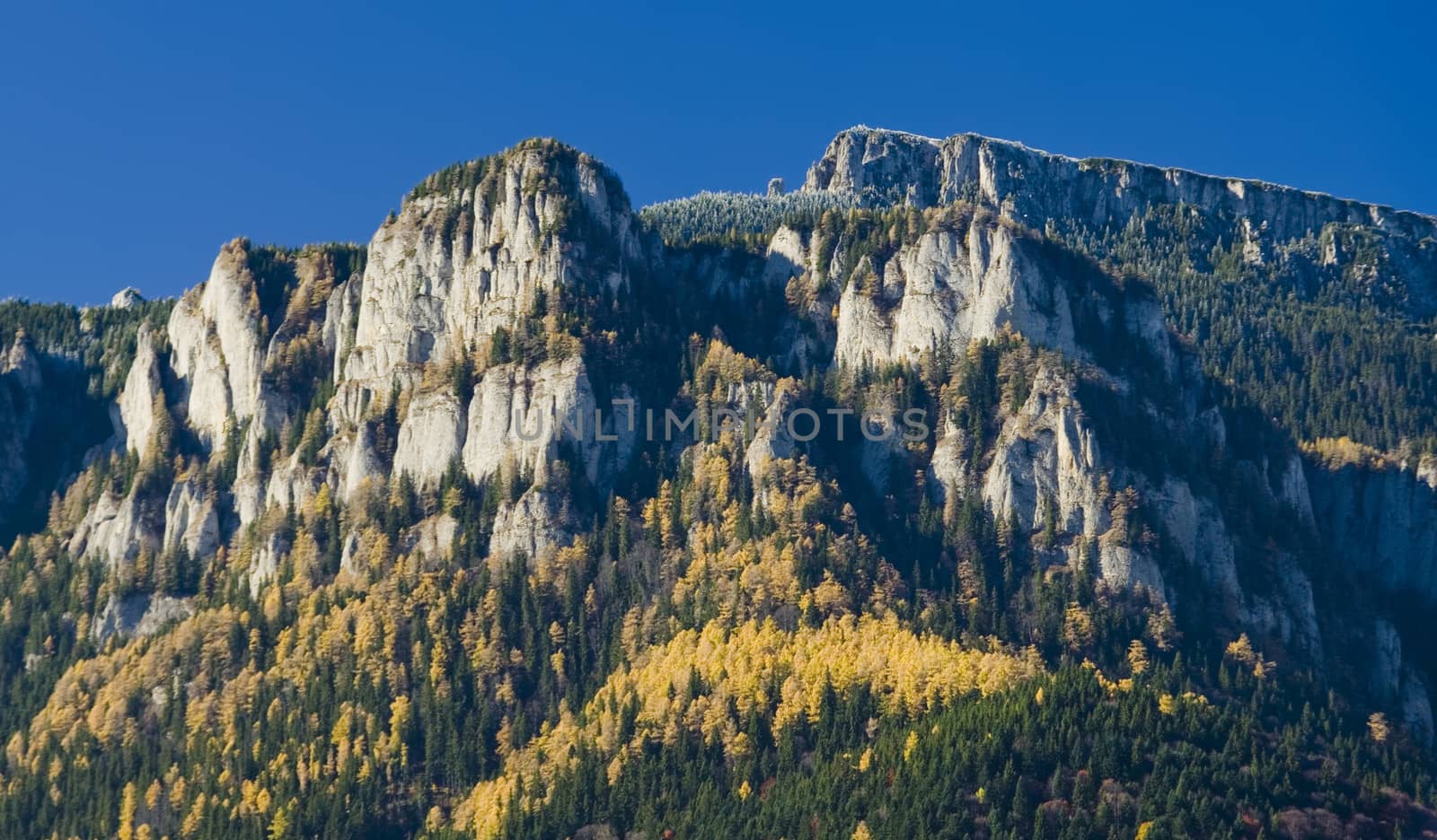rocky mountain peak in autumn landscape