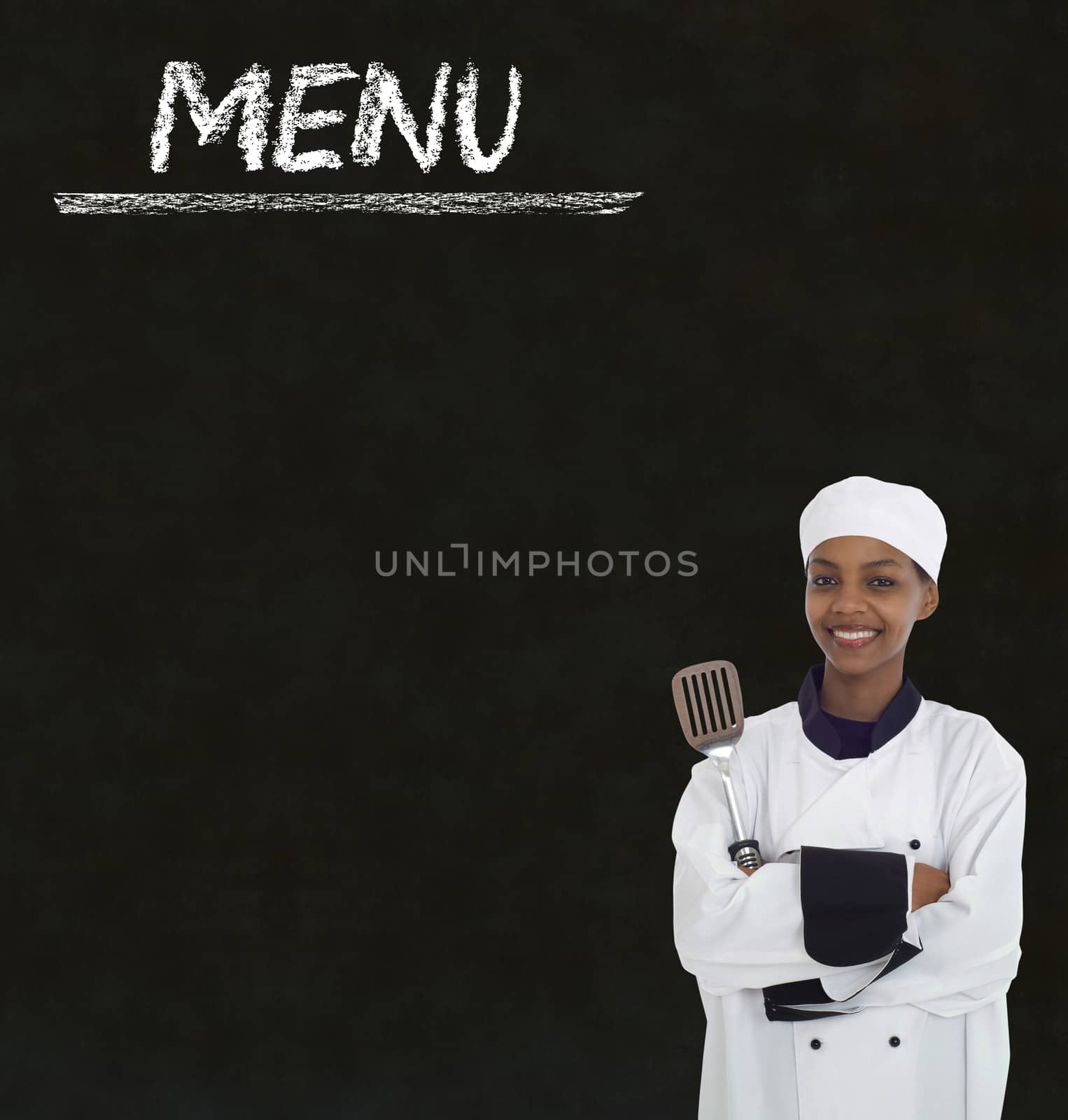 Chef with chalk menu sign on a blackboard background by alistaircotton