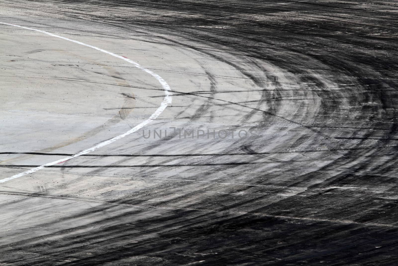 Background with tire marks on road track