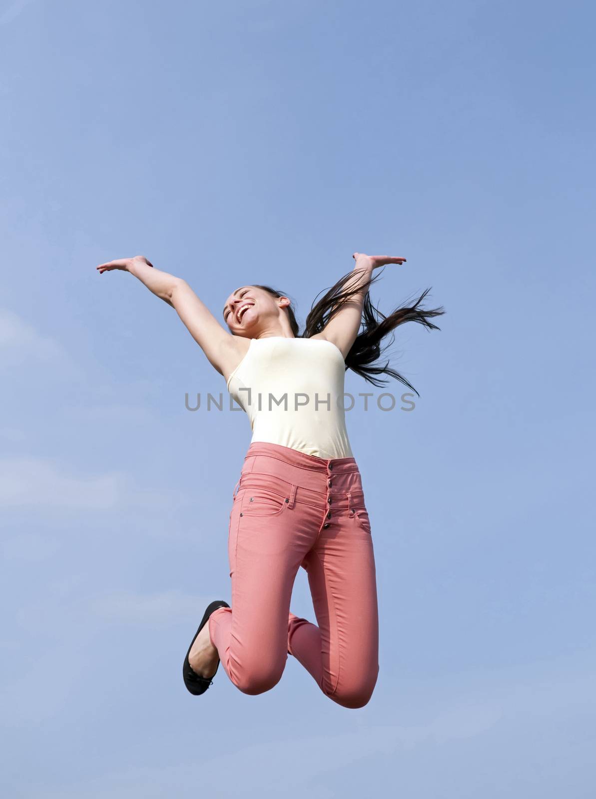  joyful woman leaping