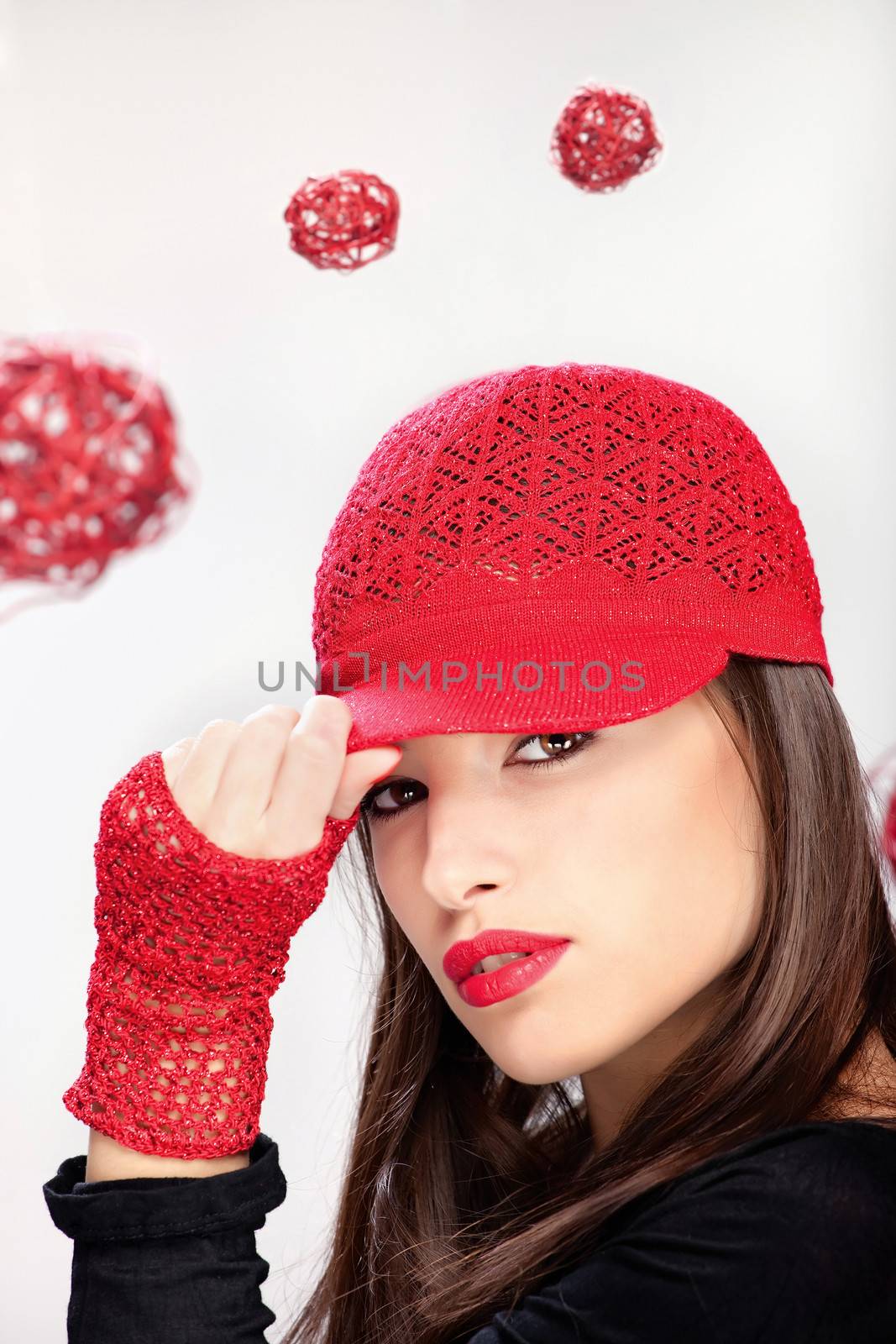 Pretty woman with red hat and gloves