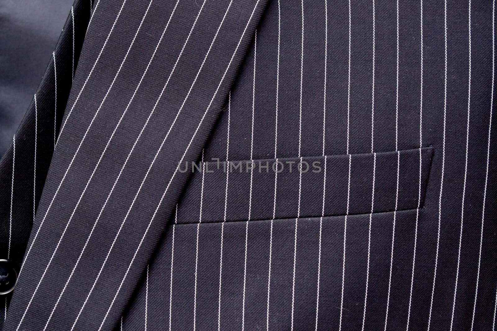 Black and white pinstripe suit detail up close