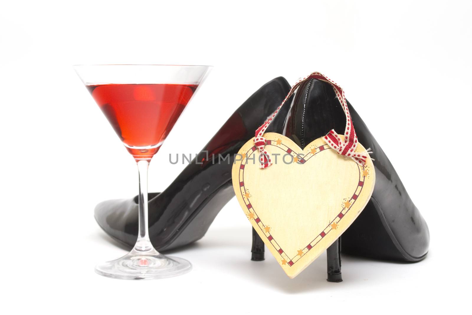 Girls night out concept with shoes, drink and lipstick