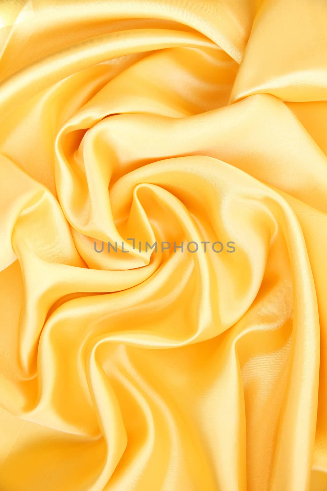 Smooth elegant golden silk as background  by oxanatravel