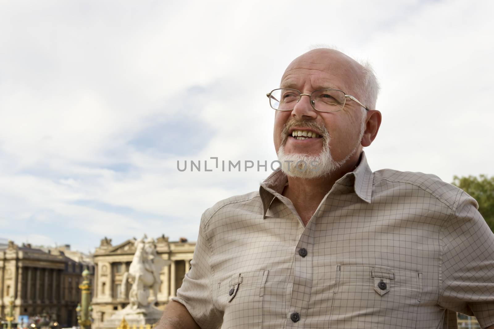 Senior man in Paris, France by Tetyana