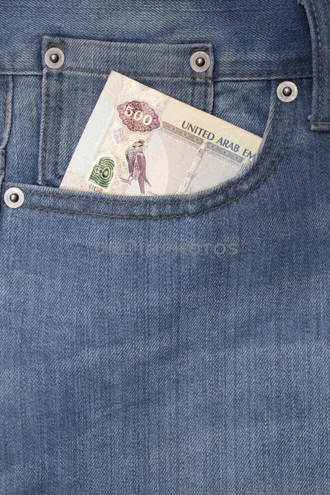 Denim jeans pocket with five hundred dirhams