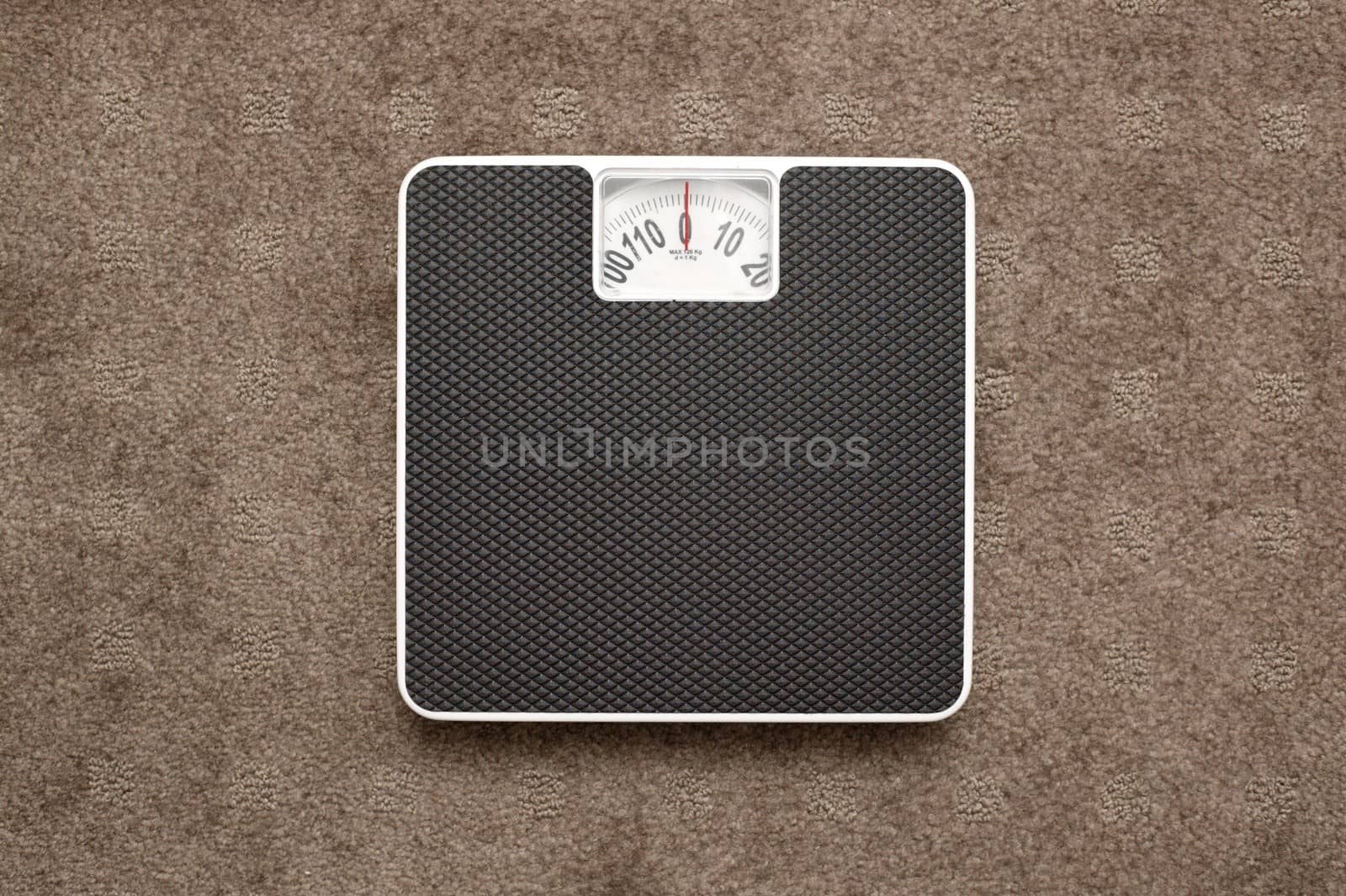 Bathroom scales isolated against a white background