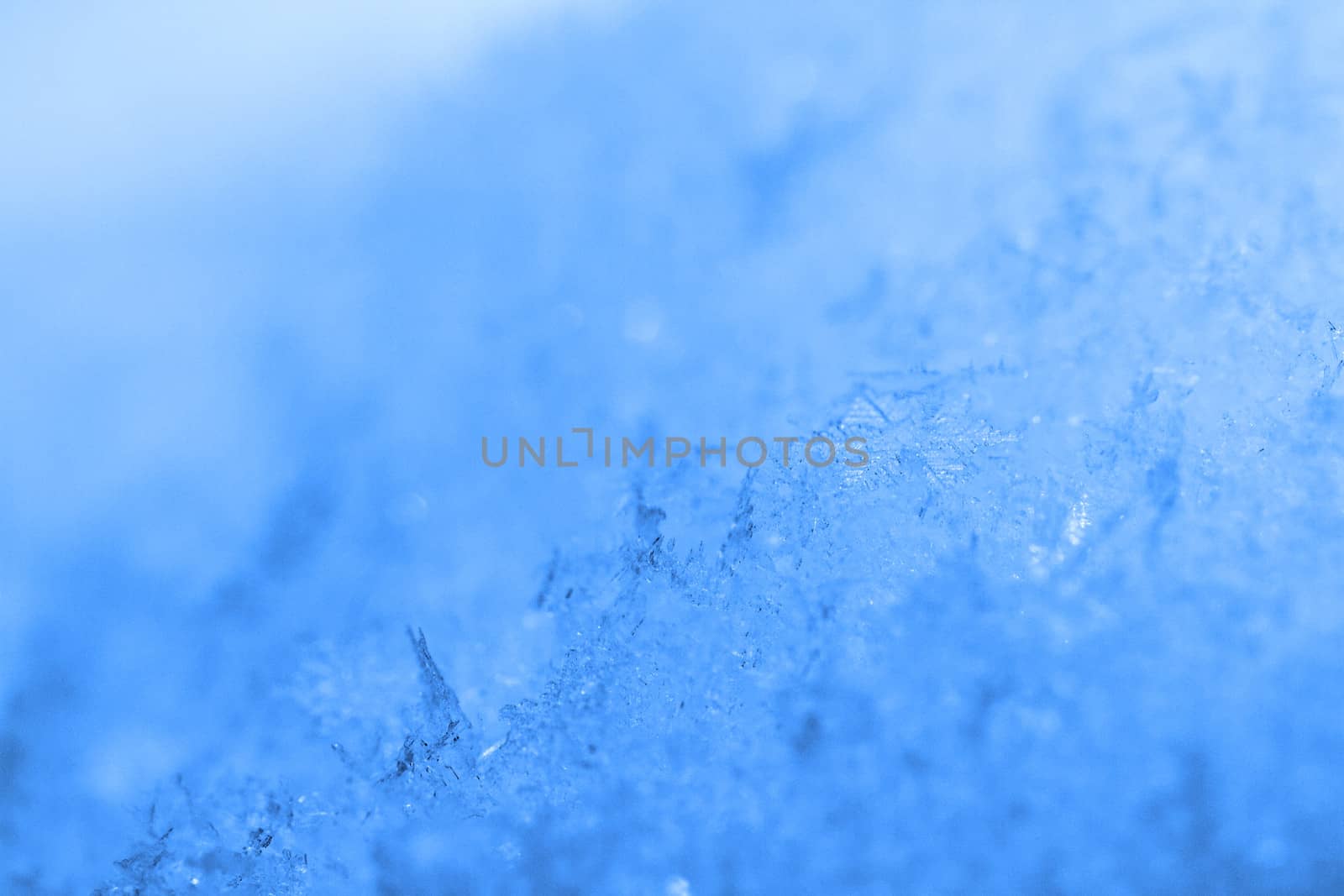 beauty blue snowflake crystals on dark background