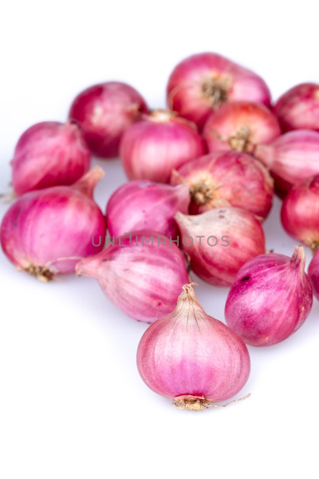 Pile of Shallots vegetables on white  background