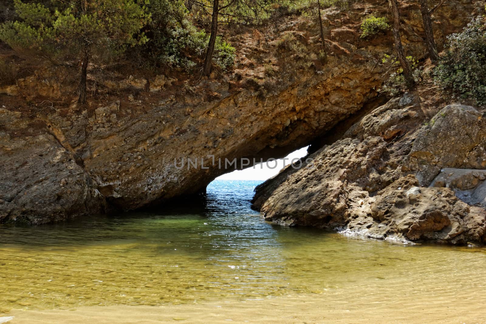 tripiti rocky beach with turquise sea on greece thassos island