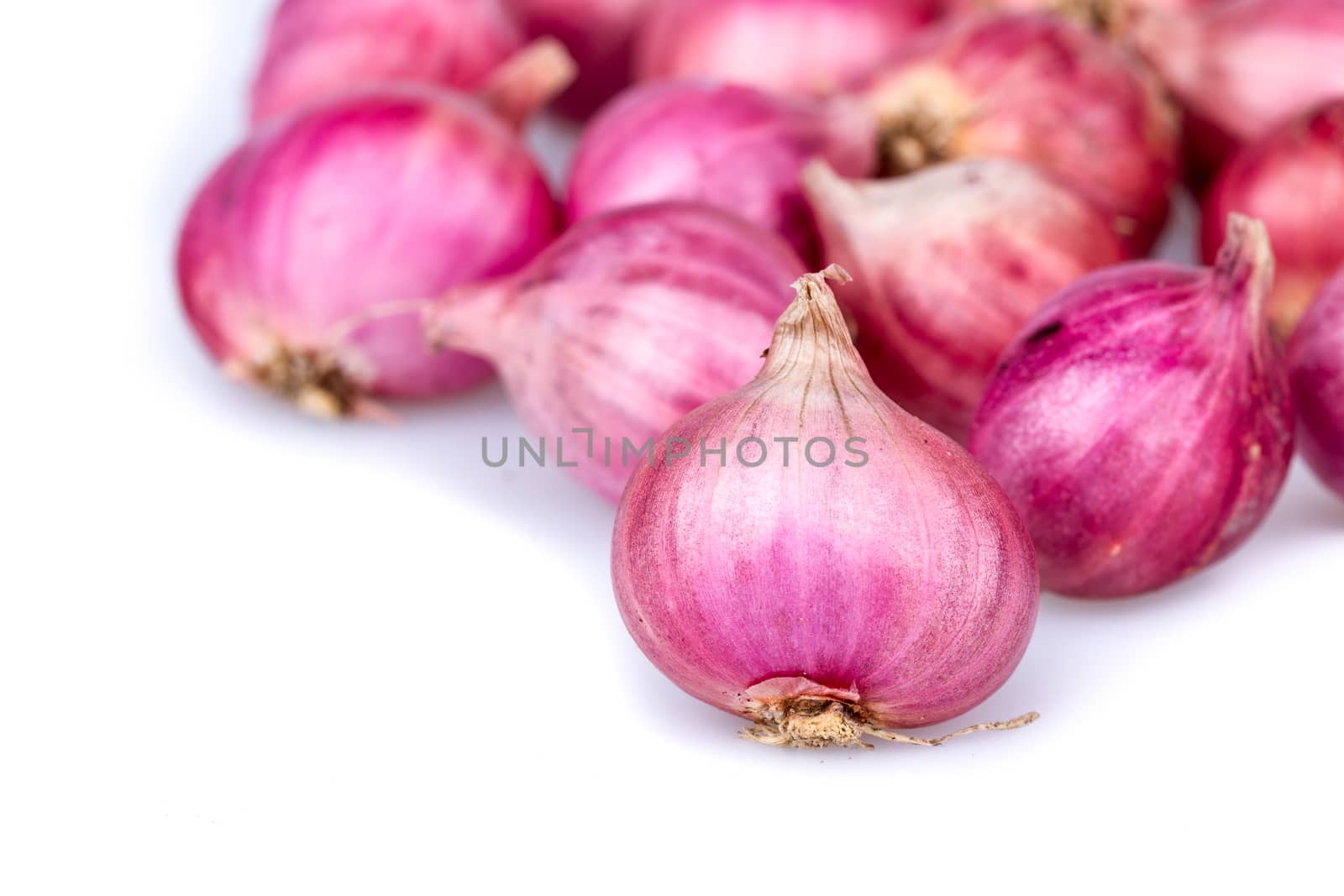 Pile of Shallots vegetables on white  background