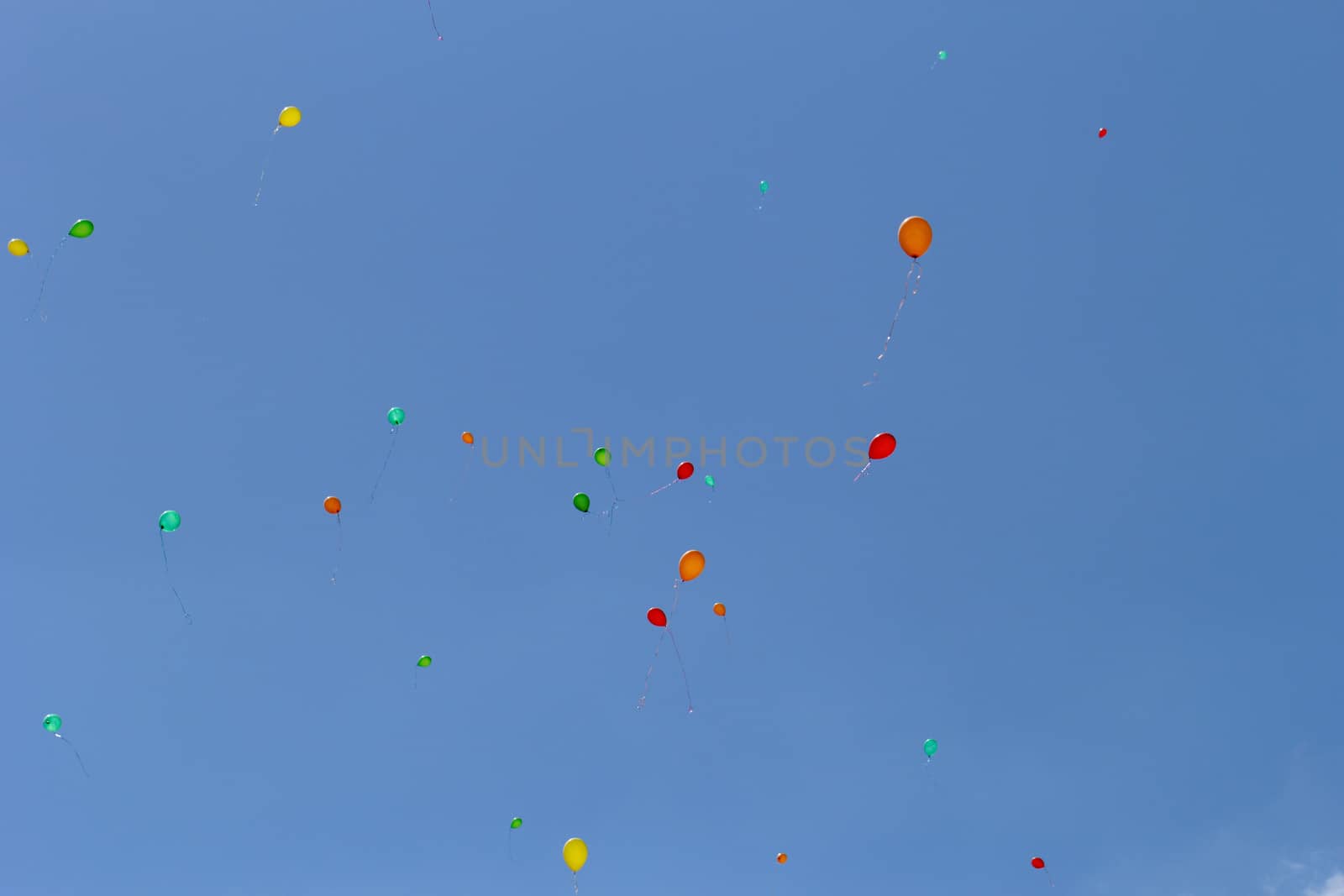 color balloons flying to the sky