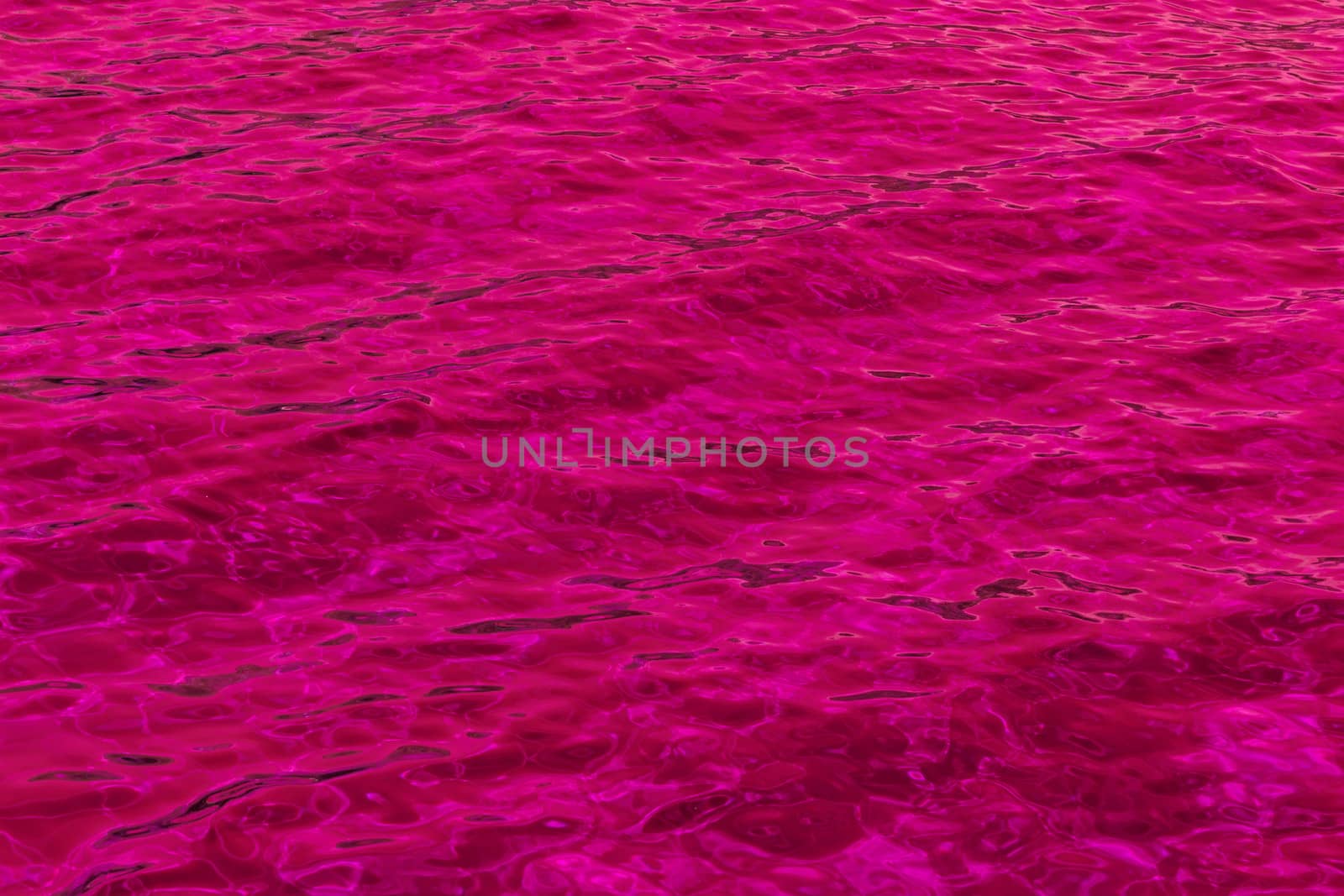 purple abstract background of wavy water surface by NagyDodo