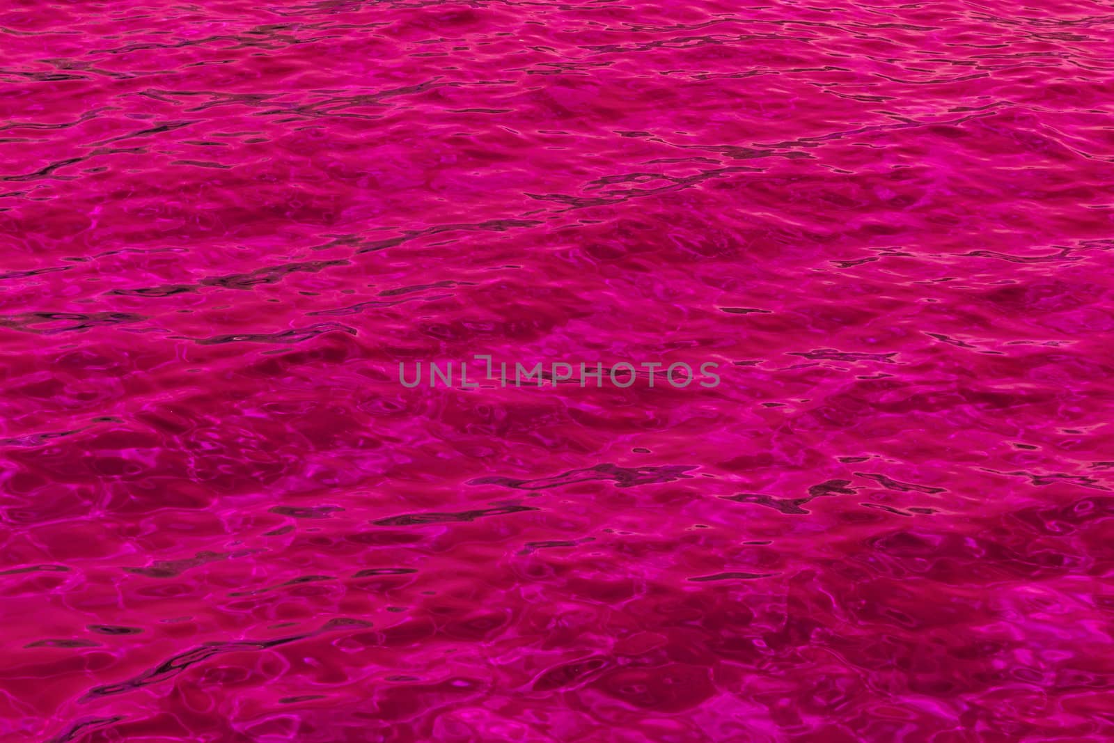 purple abstract background of wavy water surface (lilac)