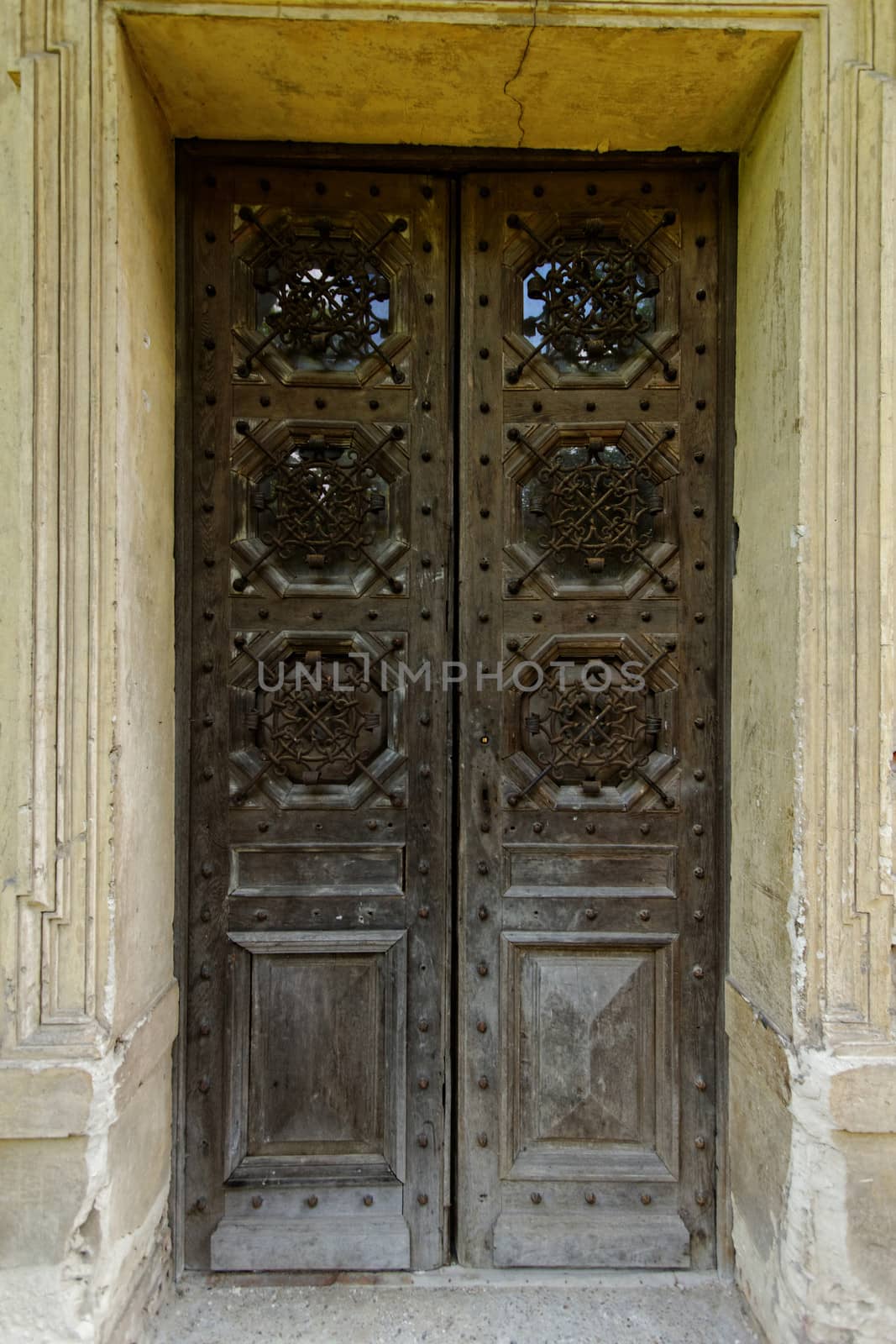 ancient wooden door on the old castle