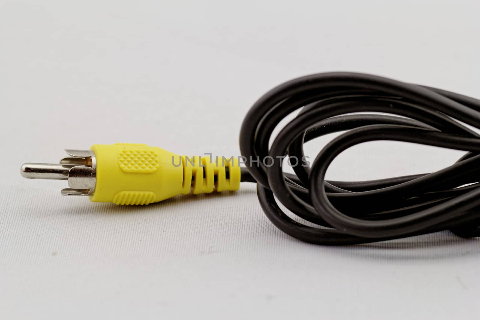 only yellow video RCA cable on a white background