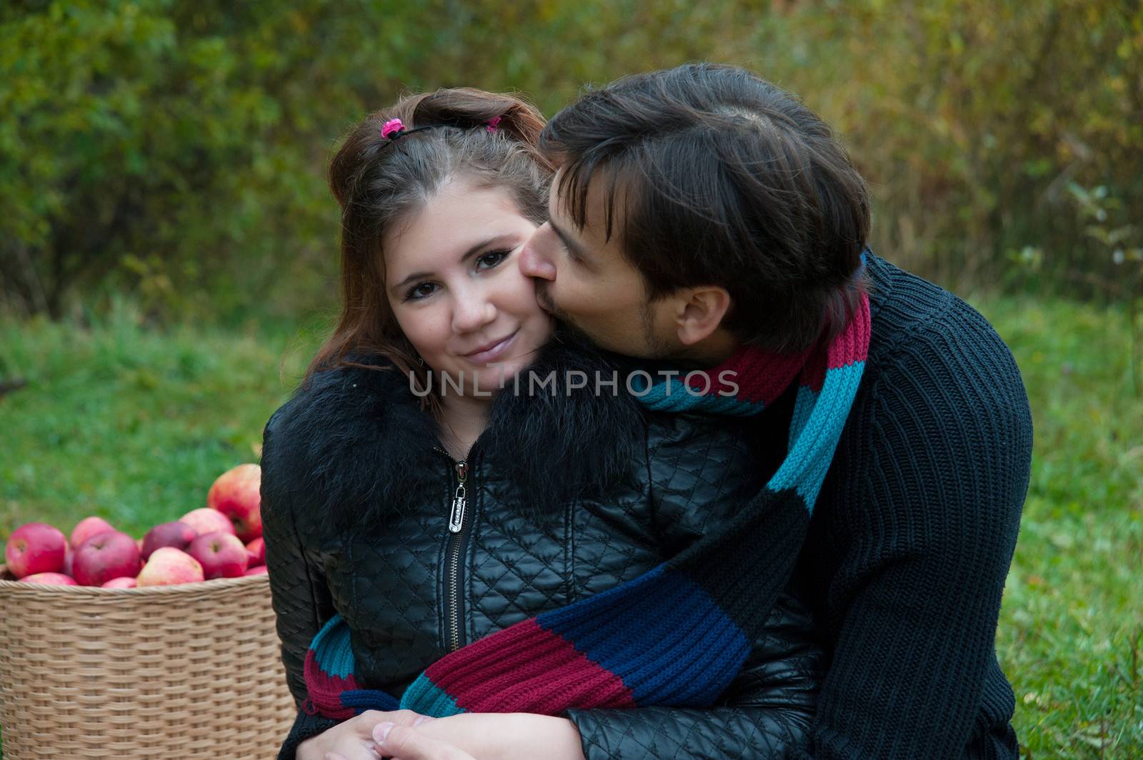 young couple embracing in autumn nature