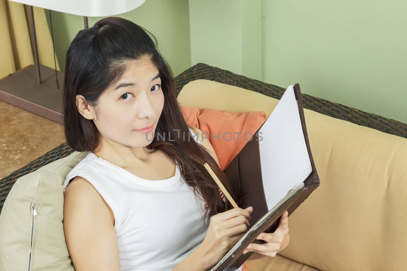 Asian young business woman working by FrameAngel