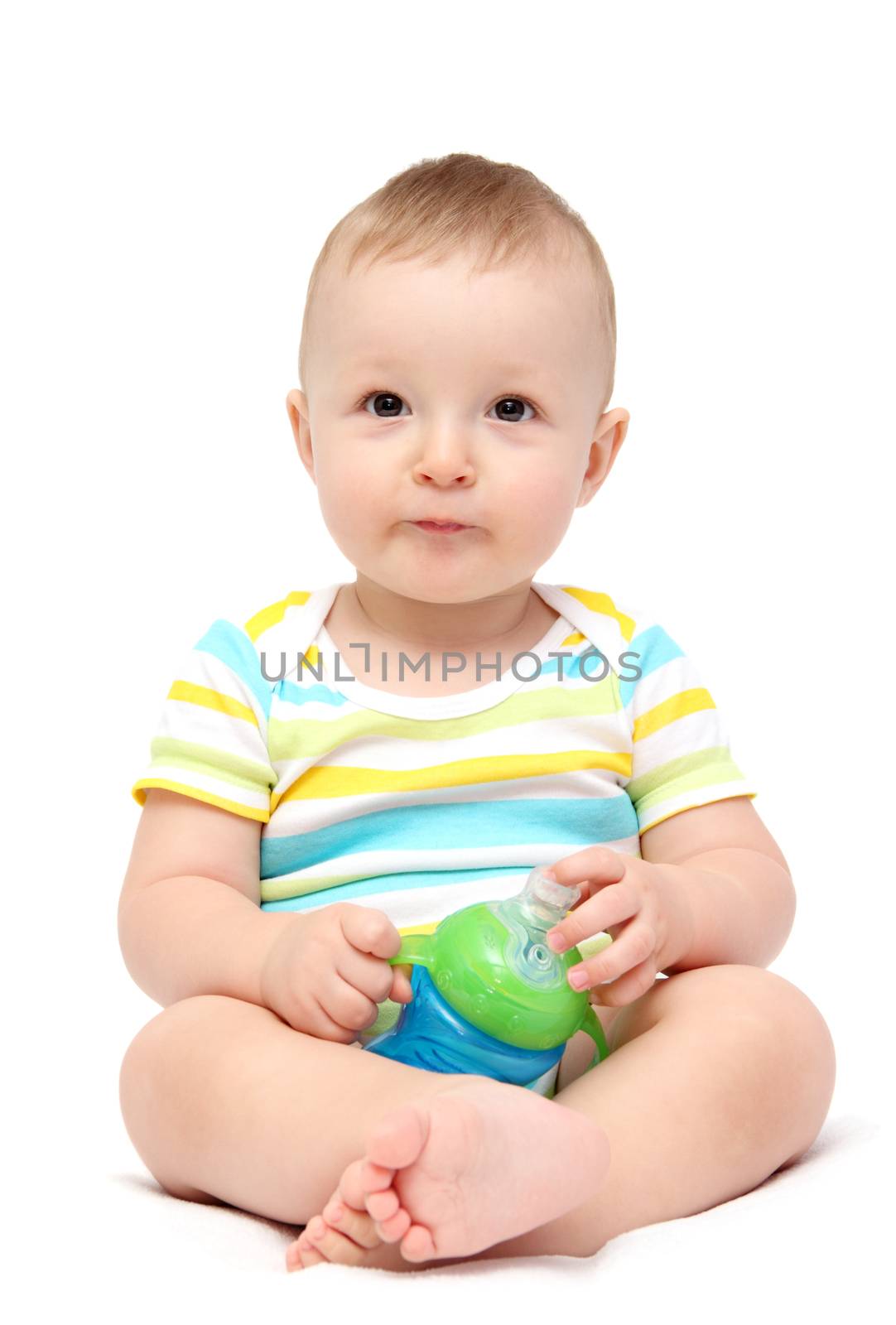 baby boy holding milk bottle by NikolayK