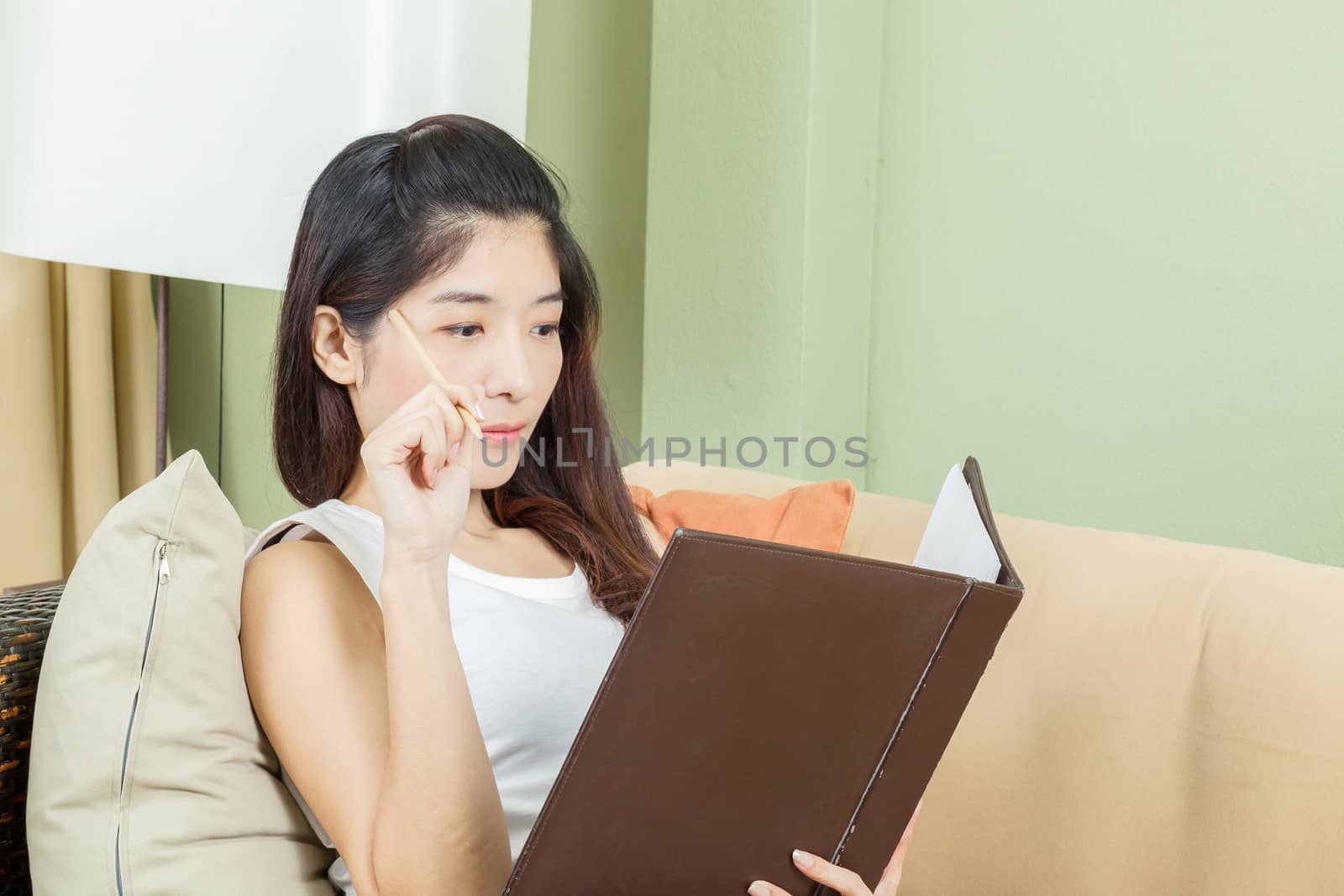 Asian young business woman working by FrameAngel