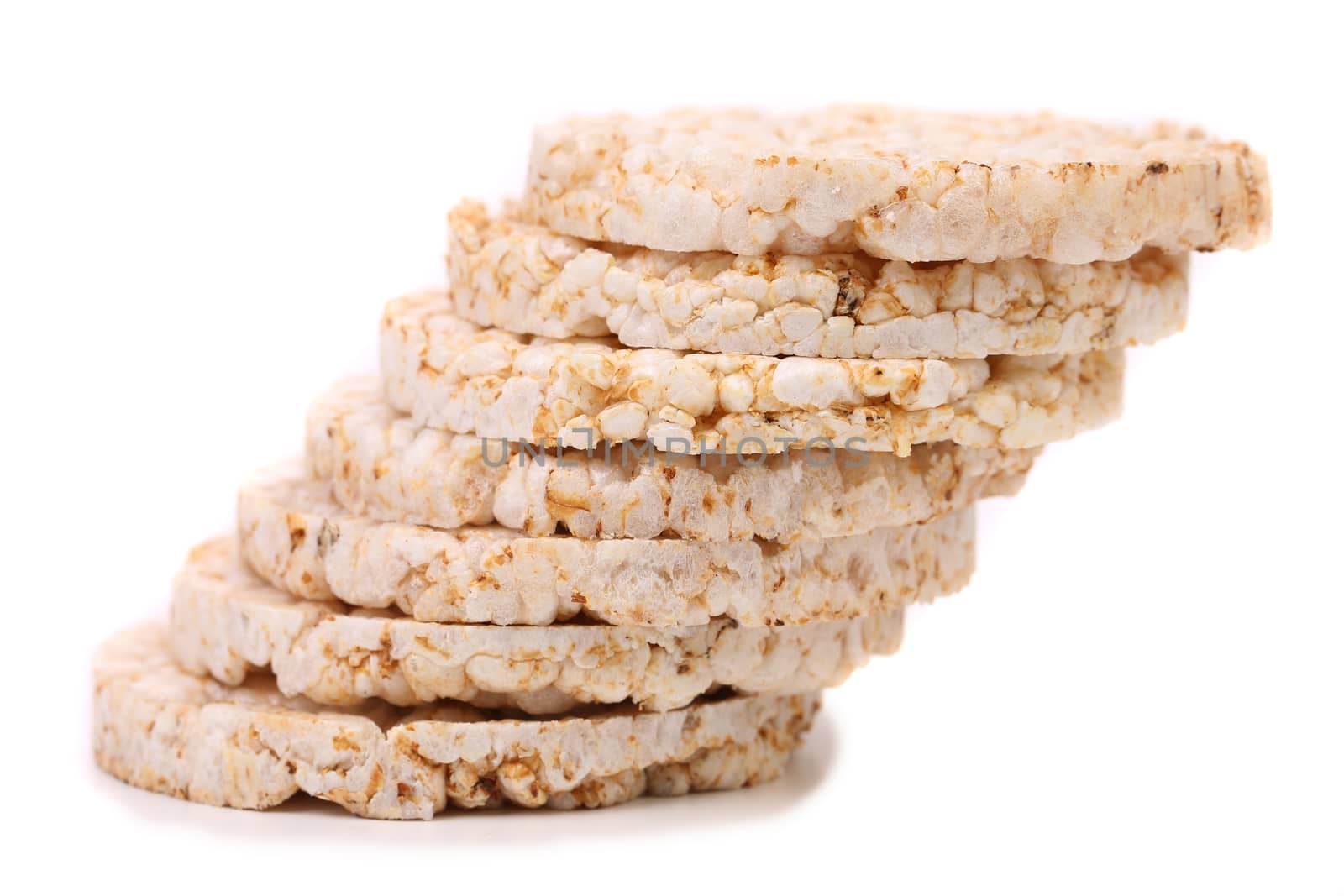 Stack of a puffed rice snack on white background with clipping path