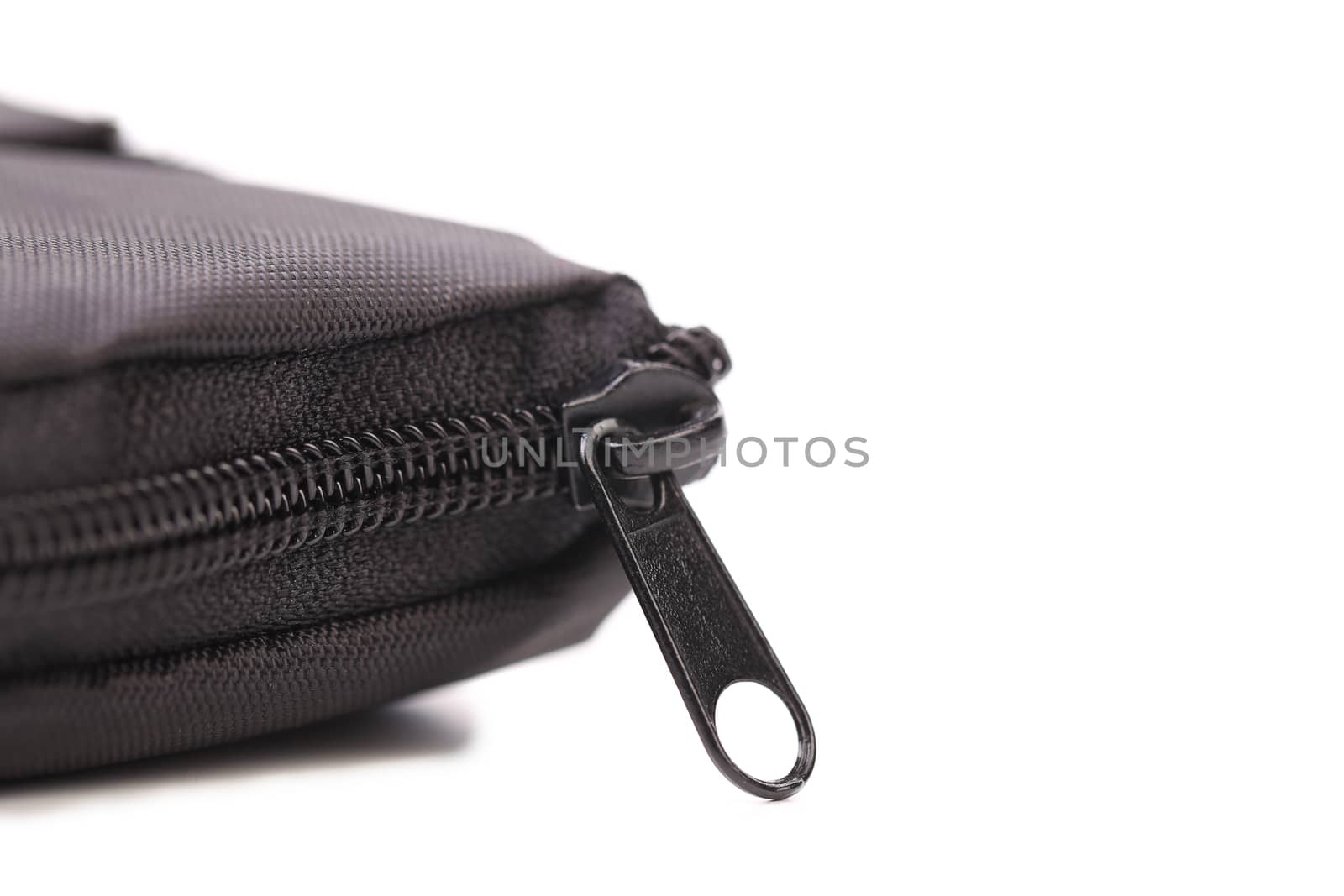 Plastic black zipper of case. White background.