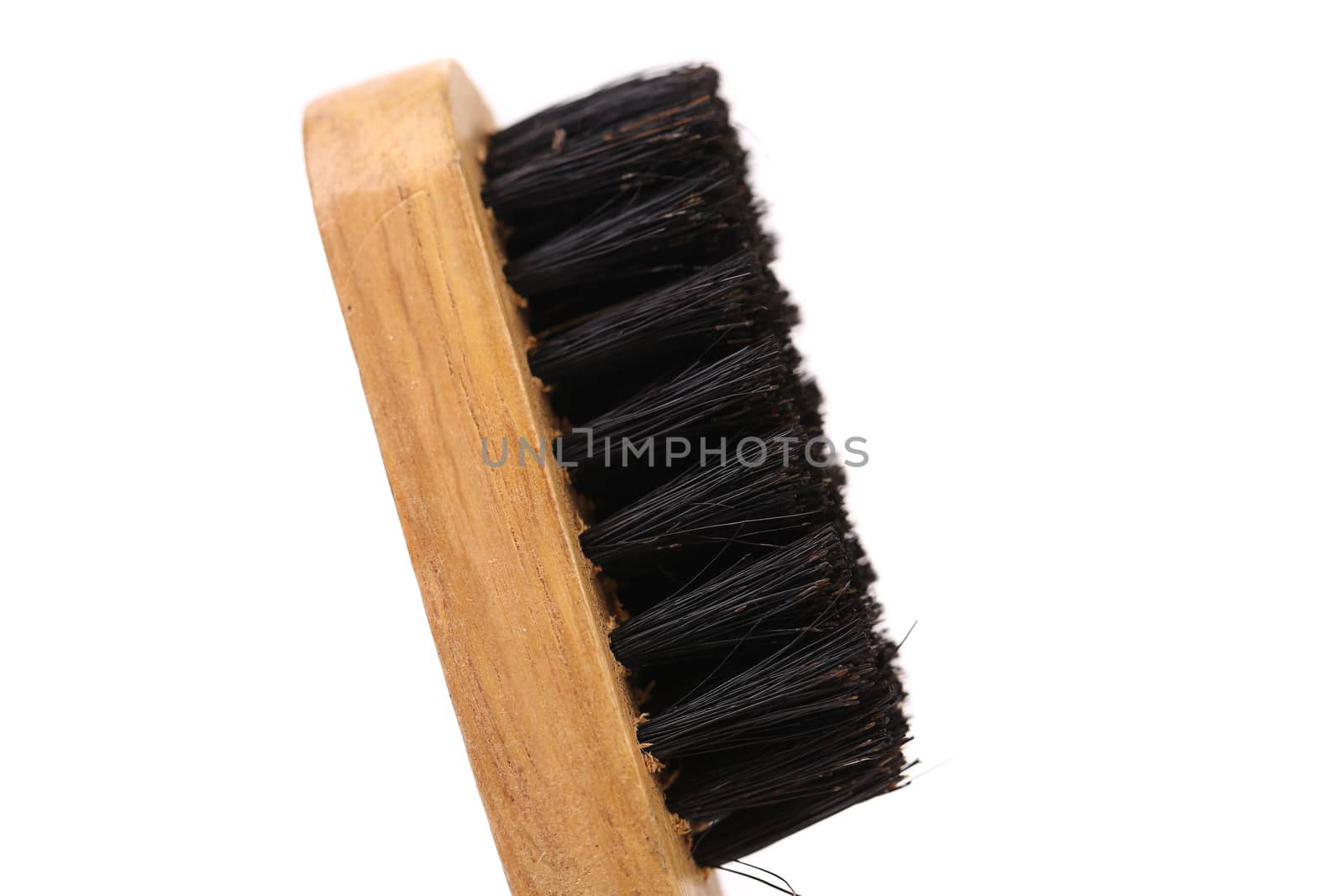 Black shoes brush isolated on a white background