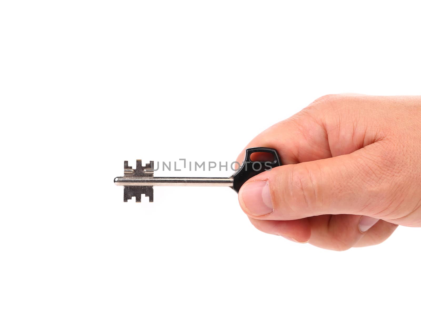 Hand holds modern steel-plastic key. White background.