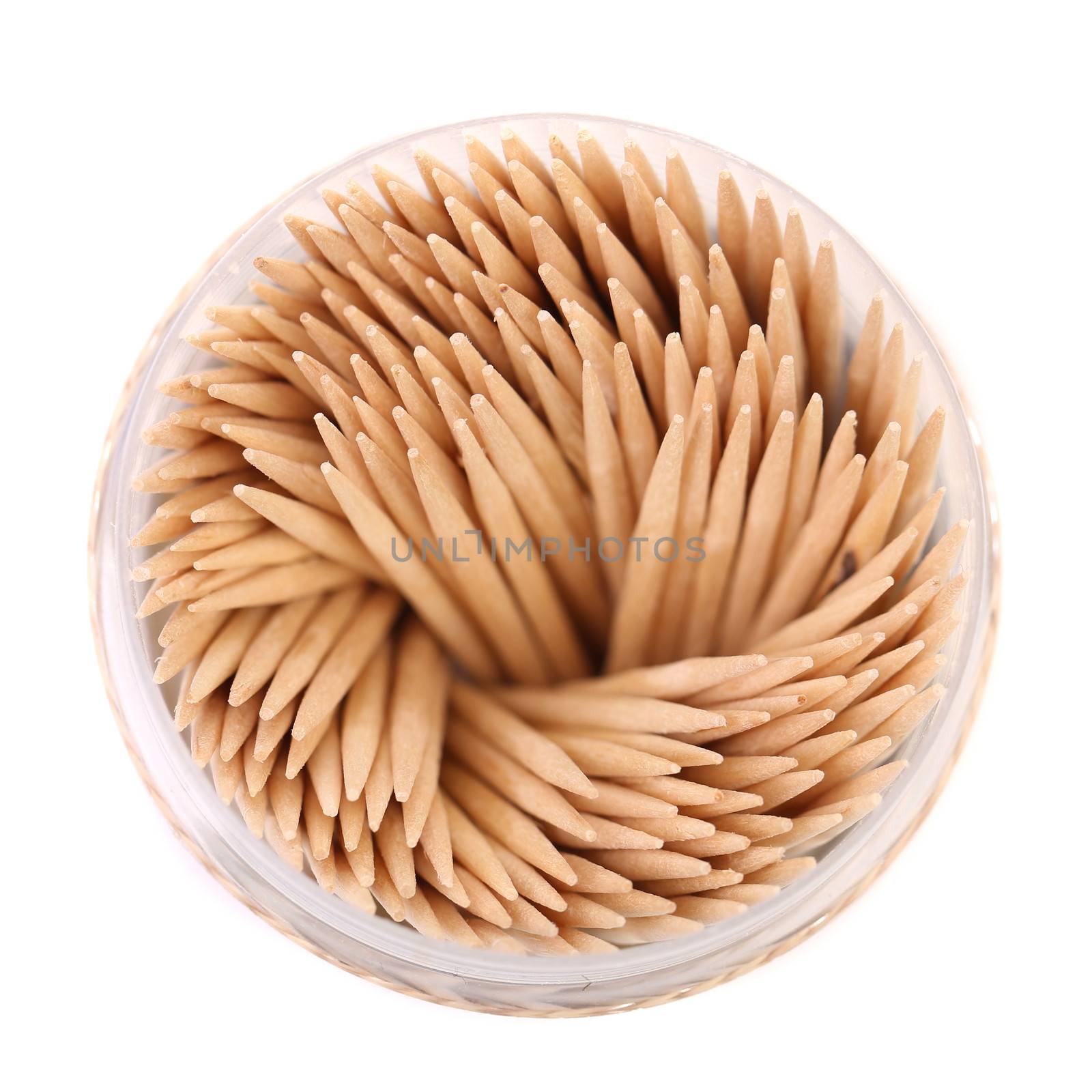 toothpicks in a round box, top view by indigolotos