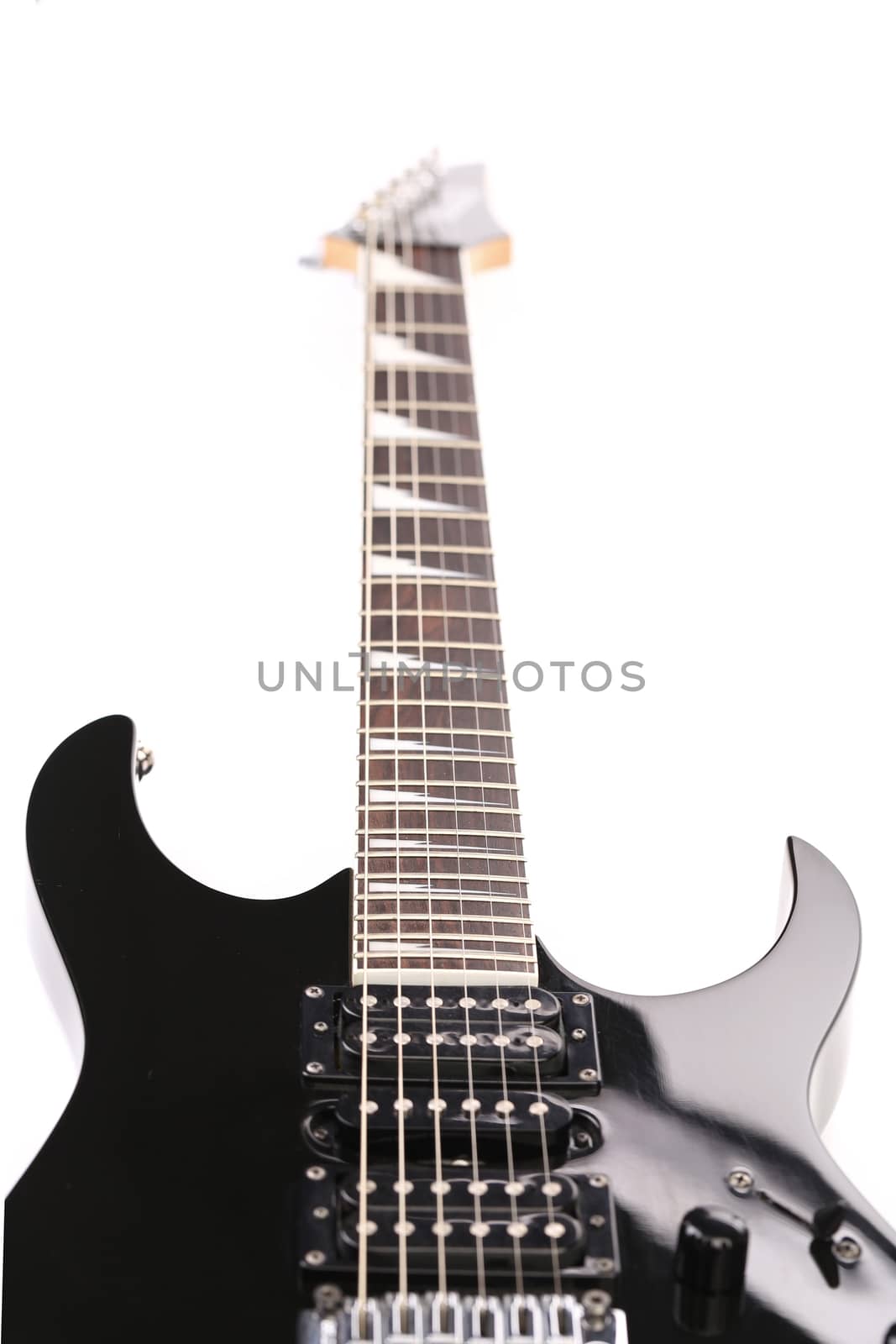 Beautiful black electric guitar isolated over white