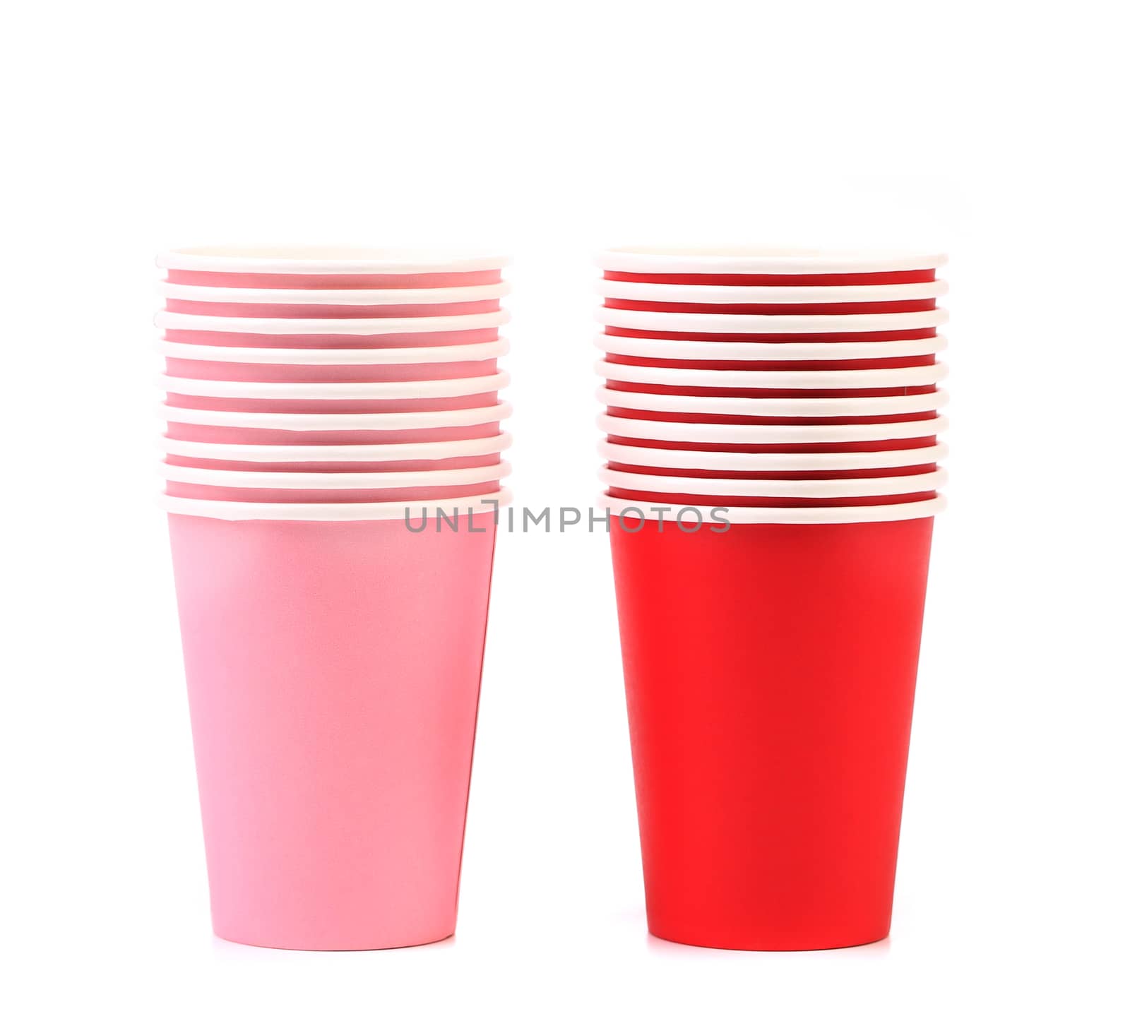 Pile of colorful paper coffee cup. Close up. White background.