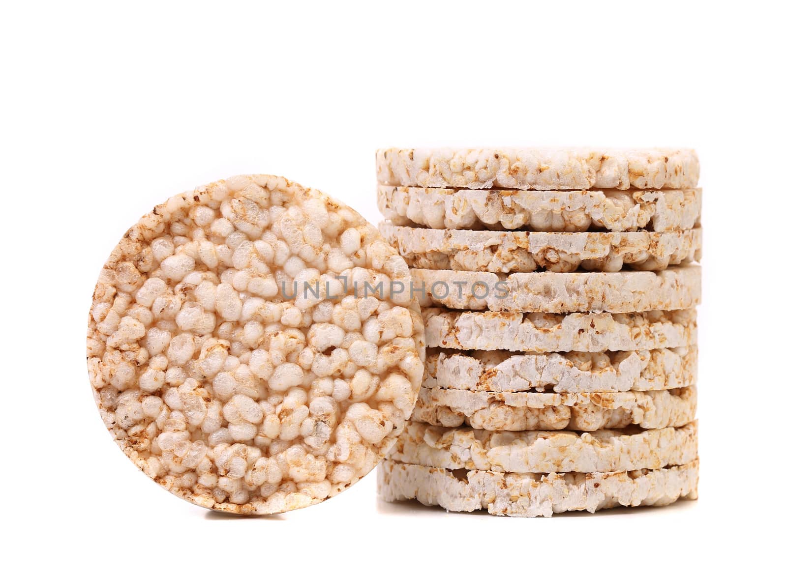 Stack of corn crackers. Close up. White background.