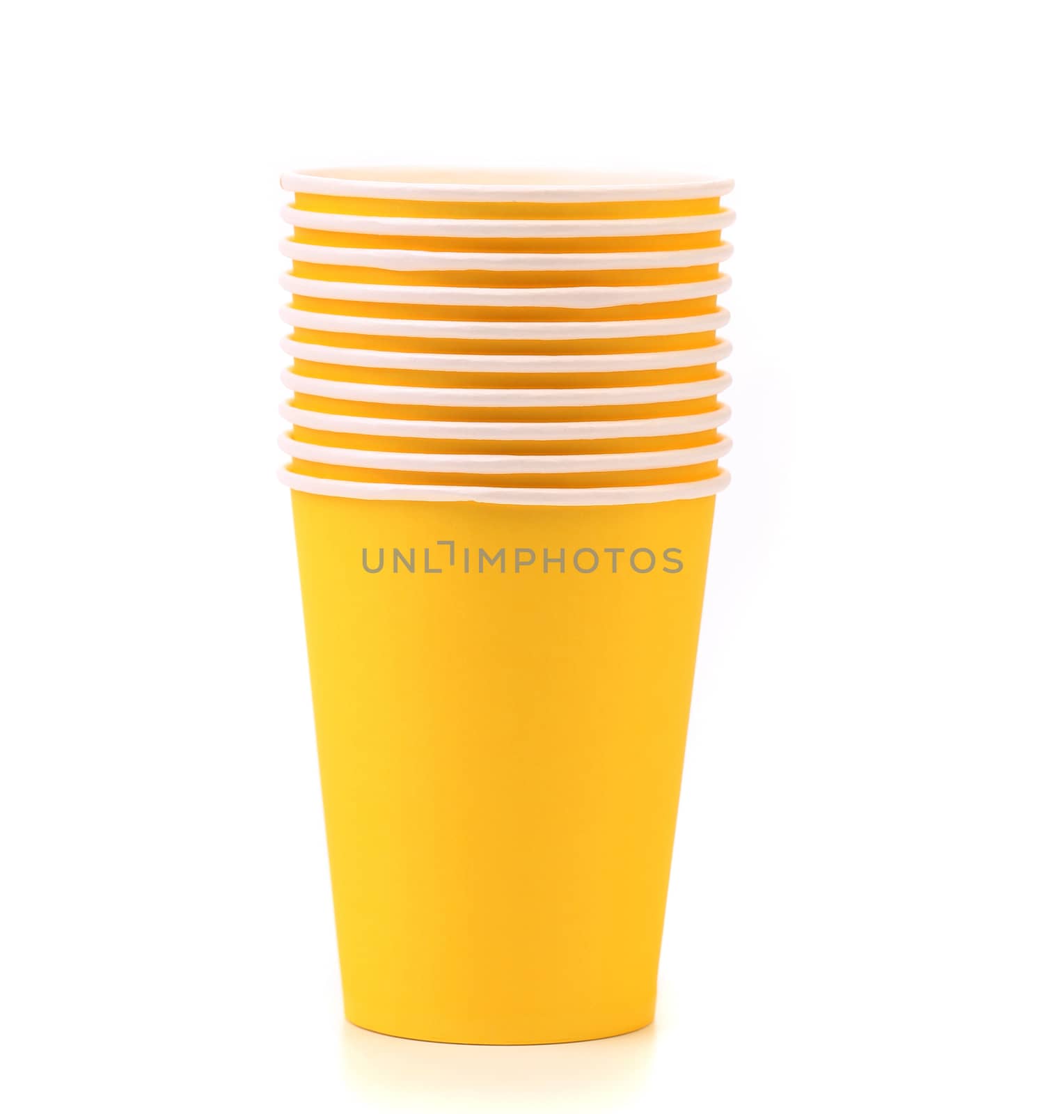Pile of colorful paper coffee cup. Close up. White background.