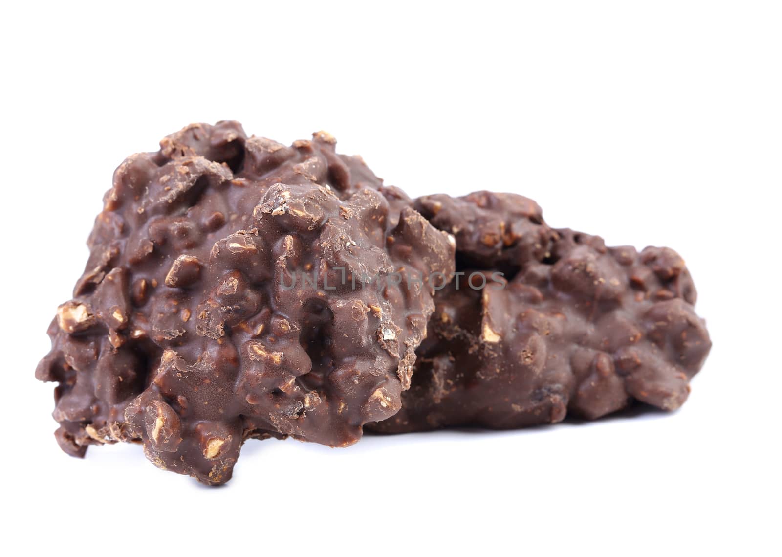 Chocolate fudge brownies with nuts, isolated on a white.